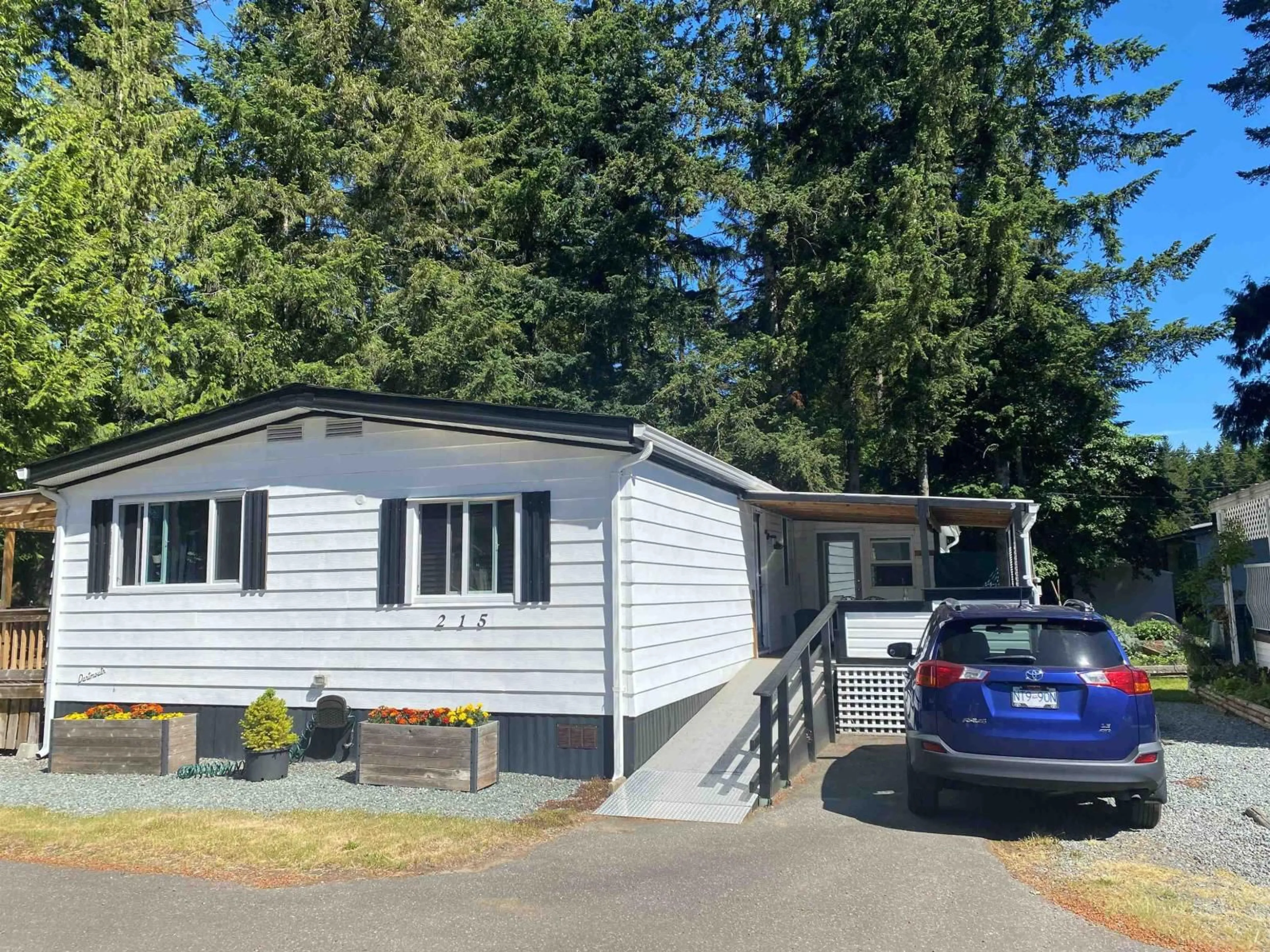 Home with vinyl exterior material, street for 215 - 20071 24 AVENUE, Langley British Columbia V2Z2A1