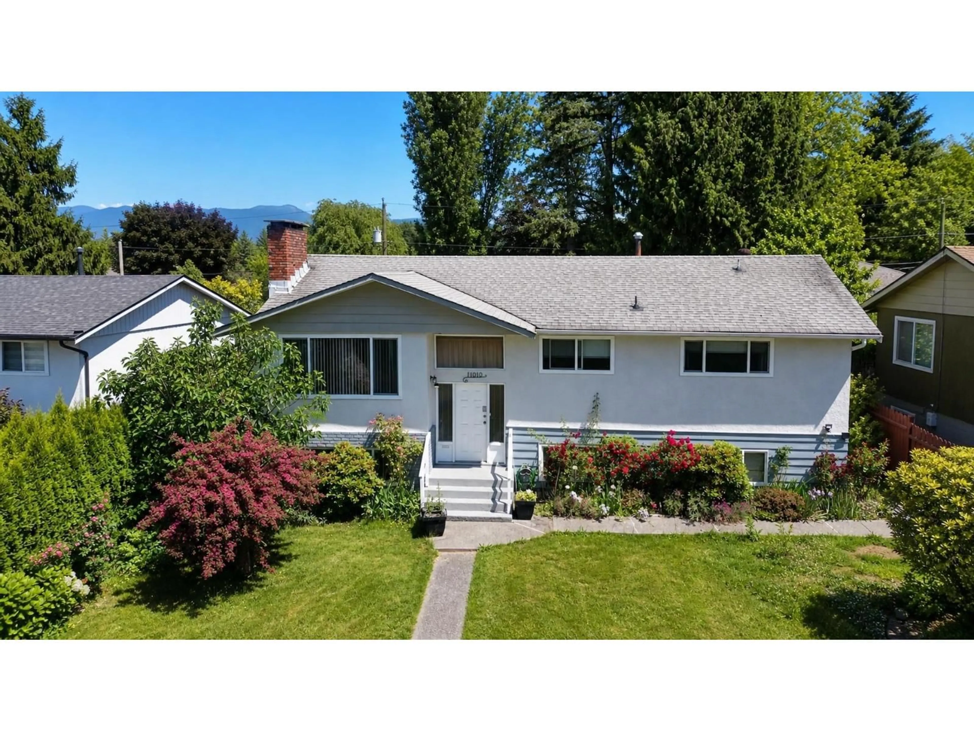 Home with vinyl exterior material, street for 11010 PARTRIDGE CRESCENT, Surrey British Columbia V3R5A8