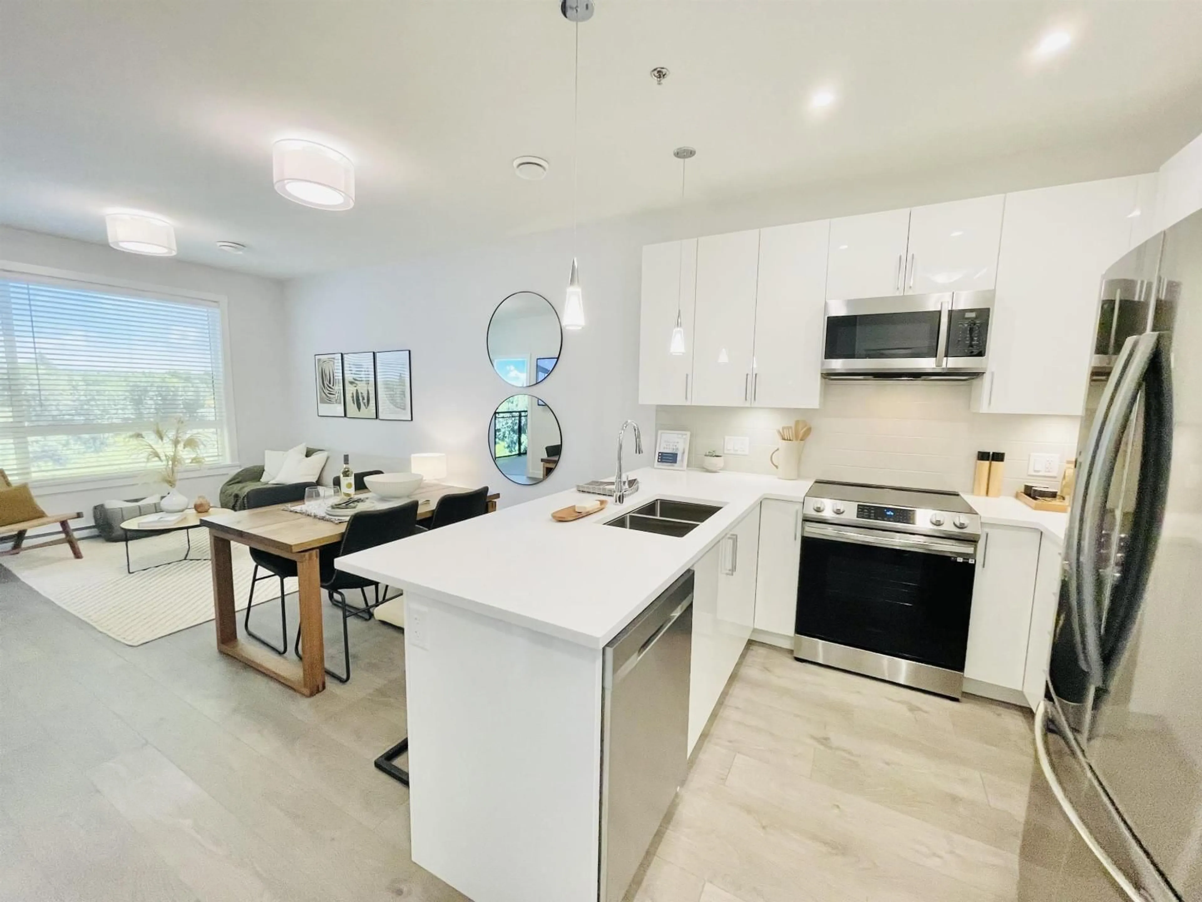 Open concept kitchen, ceramic/tile floor for 507 - 7375 HORNE STREET, Mission British Columbia V2V6T8