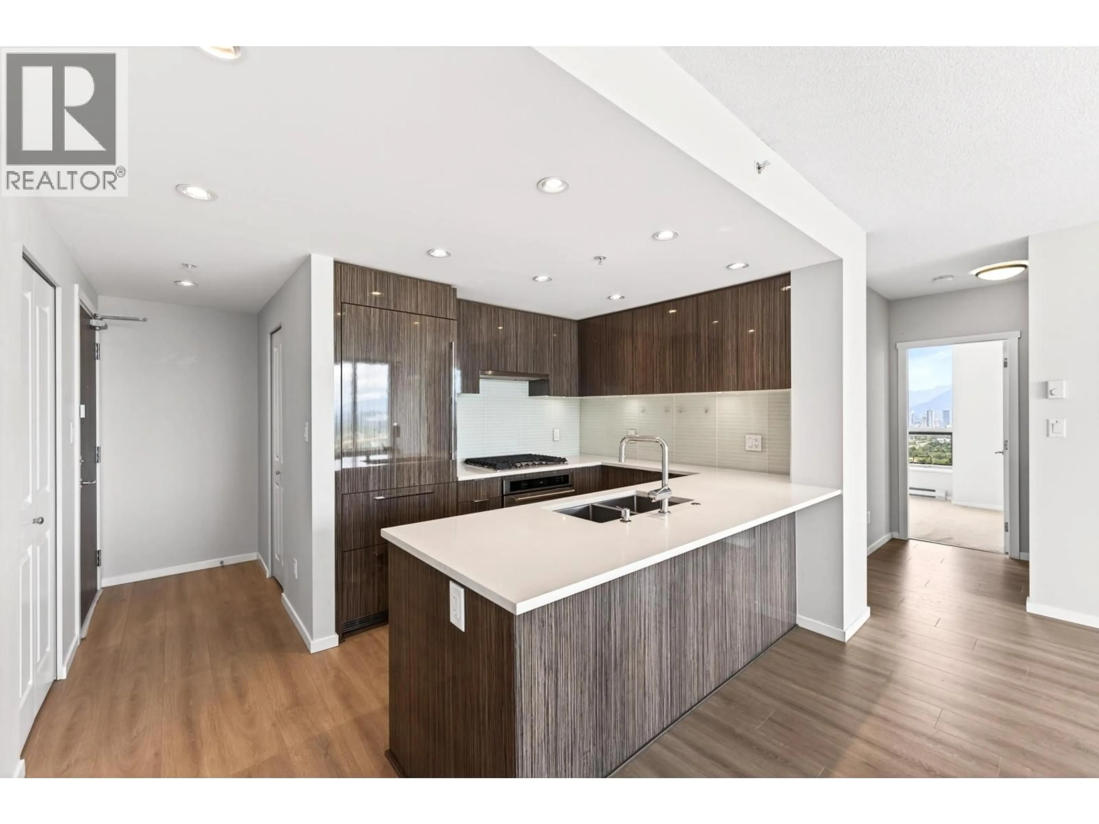 Open concept kitchen, wood/laminate floor for 2806 - 6638 DUNBLANE AVENUE, Burnaby British Columbia V5H0G8