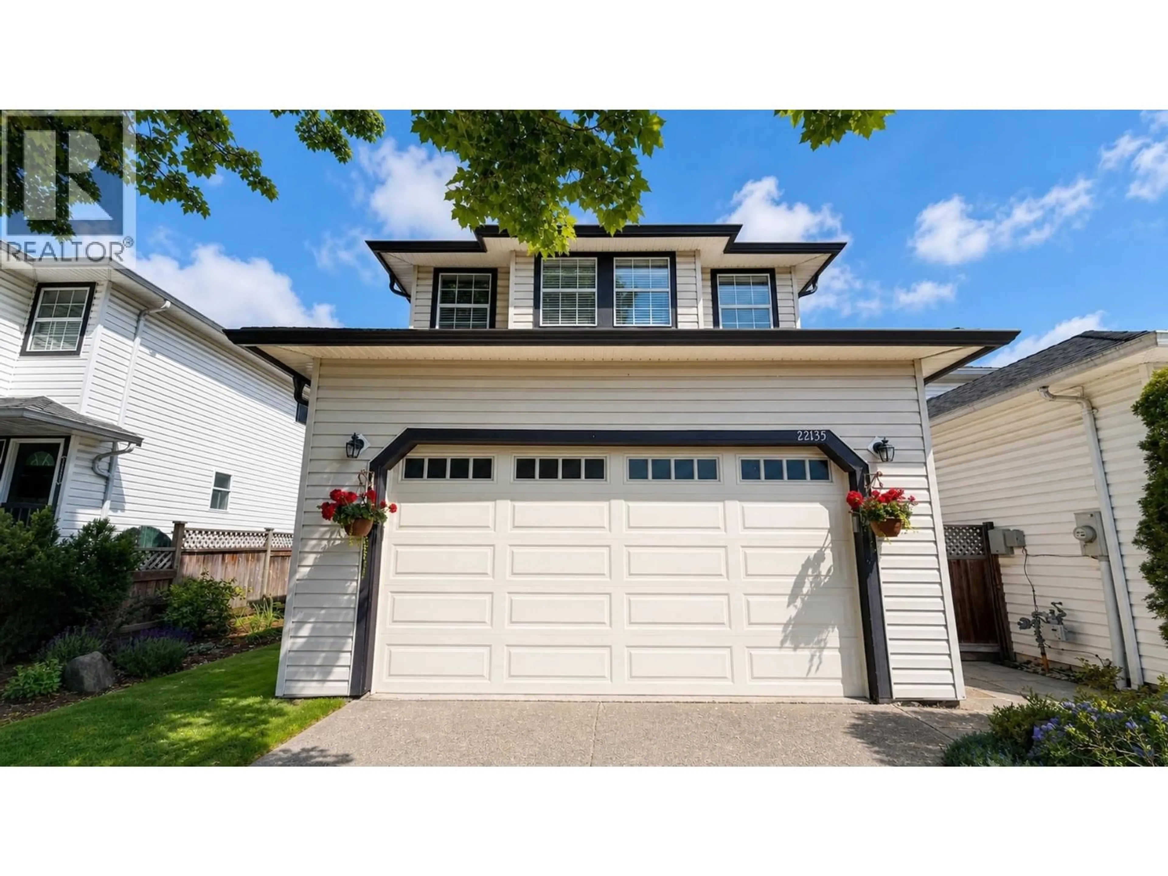 Home with vinyl exterior material, street for 22135 GARRATT DRIVE, Richmond British Columbia V6V2P4