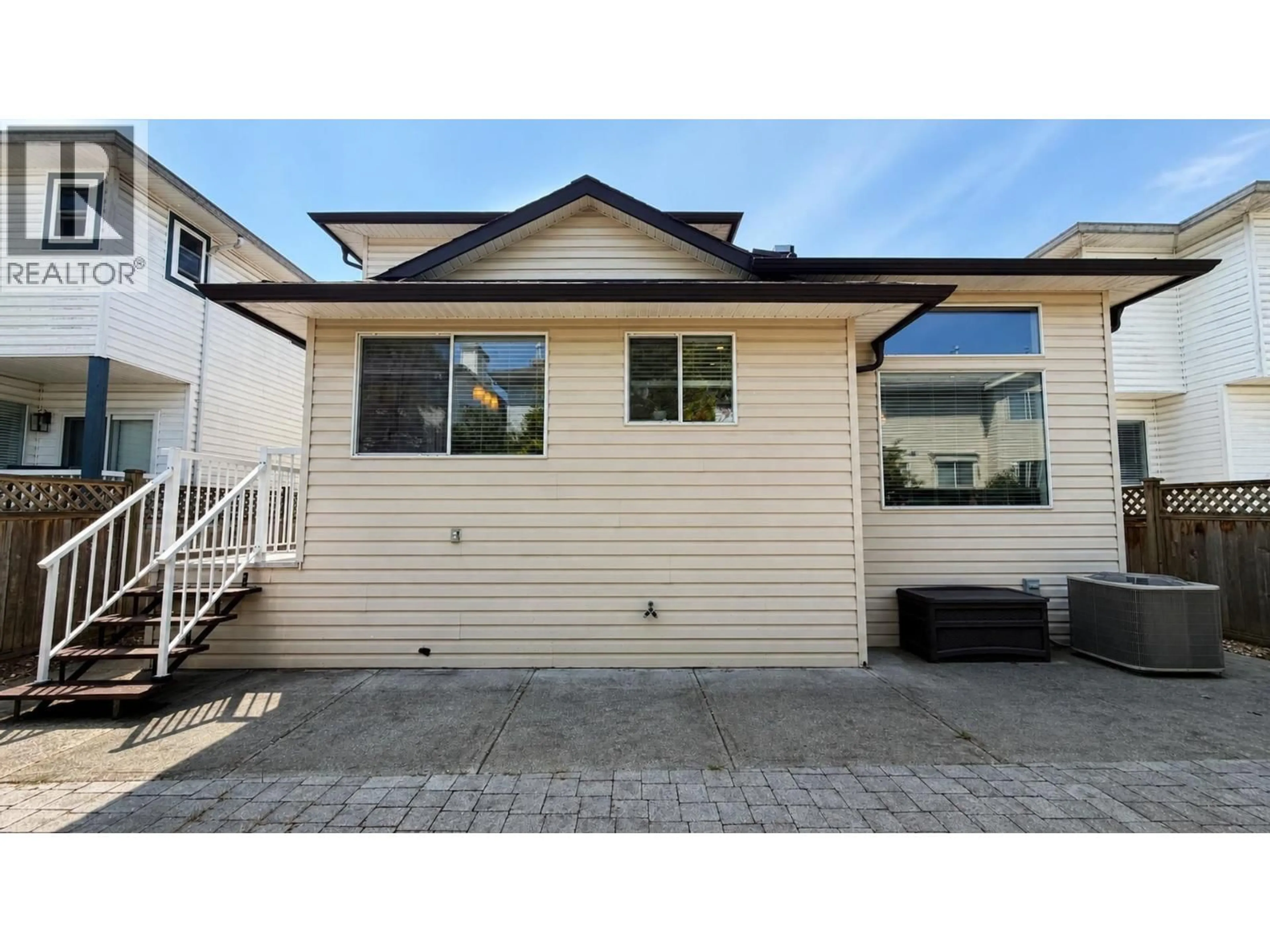 Home with vinyl exterior material, street for 22135 GARRATT DRIVE, Richmond British Columbia V6V2P4