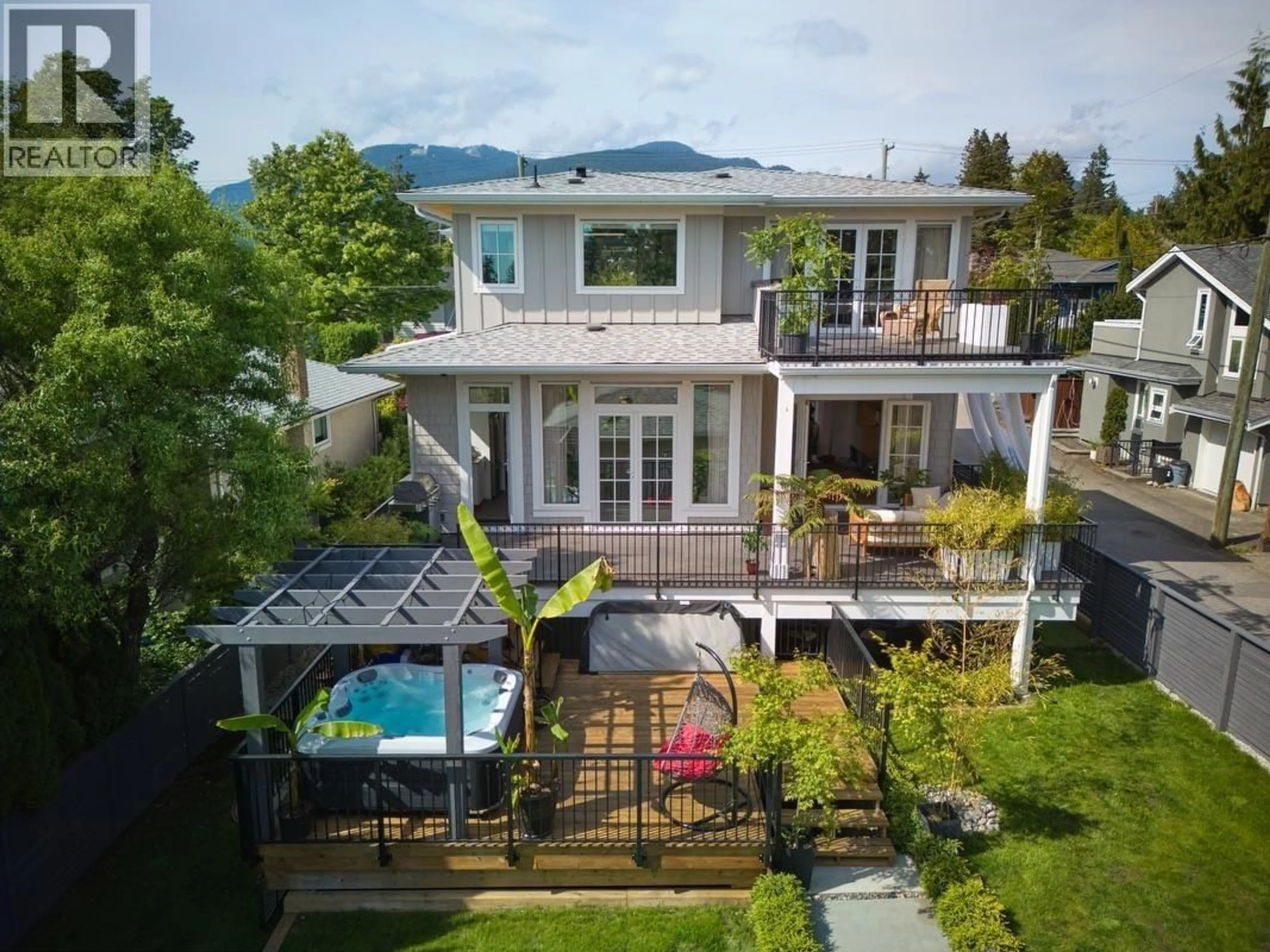 A pic from outside/outdoor area/front of a property/back of a property/a pic from drone, unknown for 449 15TH STREET, North Vancouver British Columbia V7L2R9