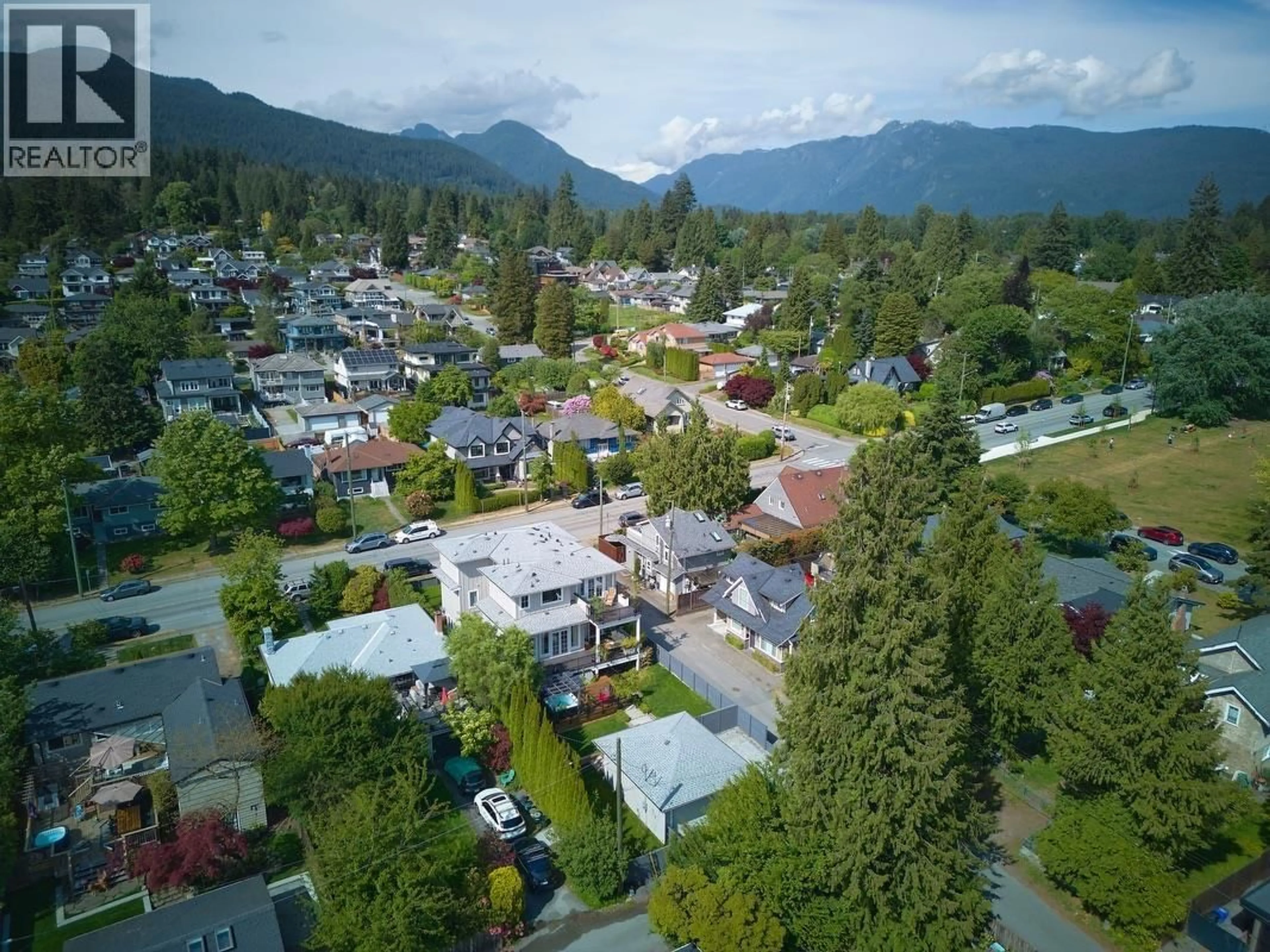 A pic from outside/outdoor area/front of a property/back of a property/a pic from drone, mountain view for 449 15TH STREET, North Vancouver British Columbia V7L2R9
