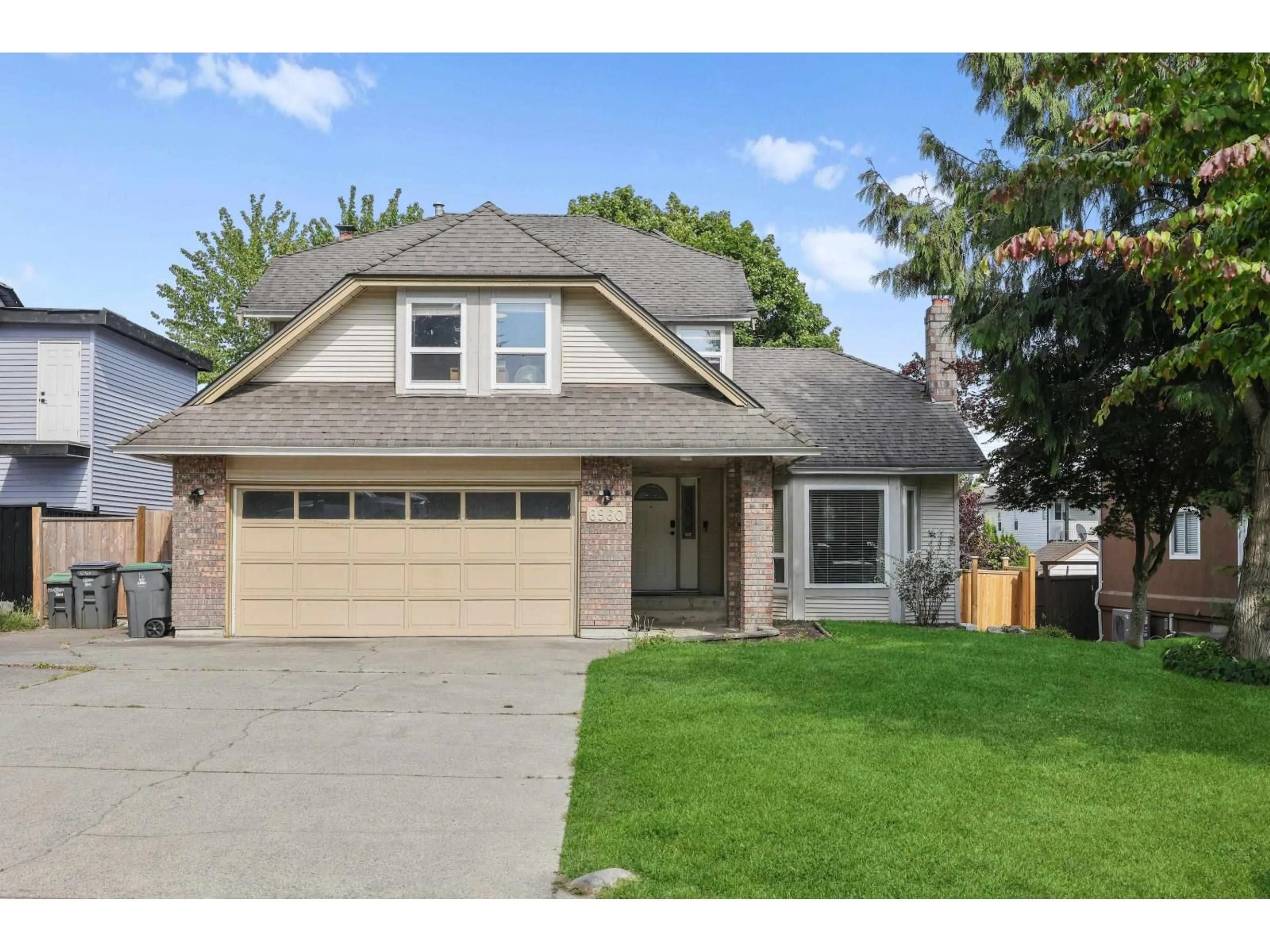 Home with vinyl exterior material, street for 6960 143A STREET, Surrey British Columbia V3W0E3
