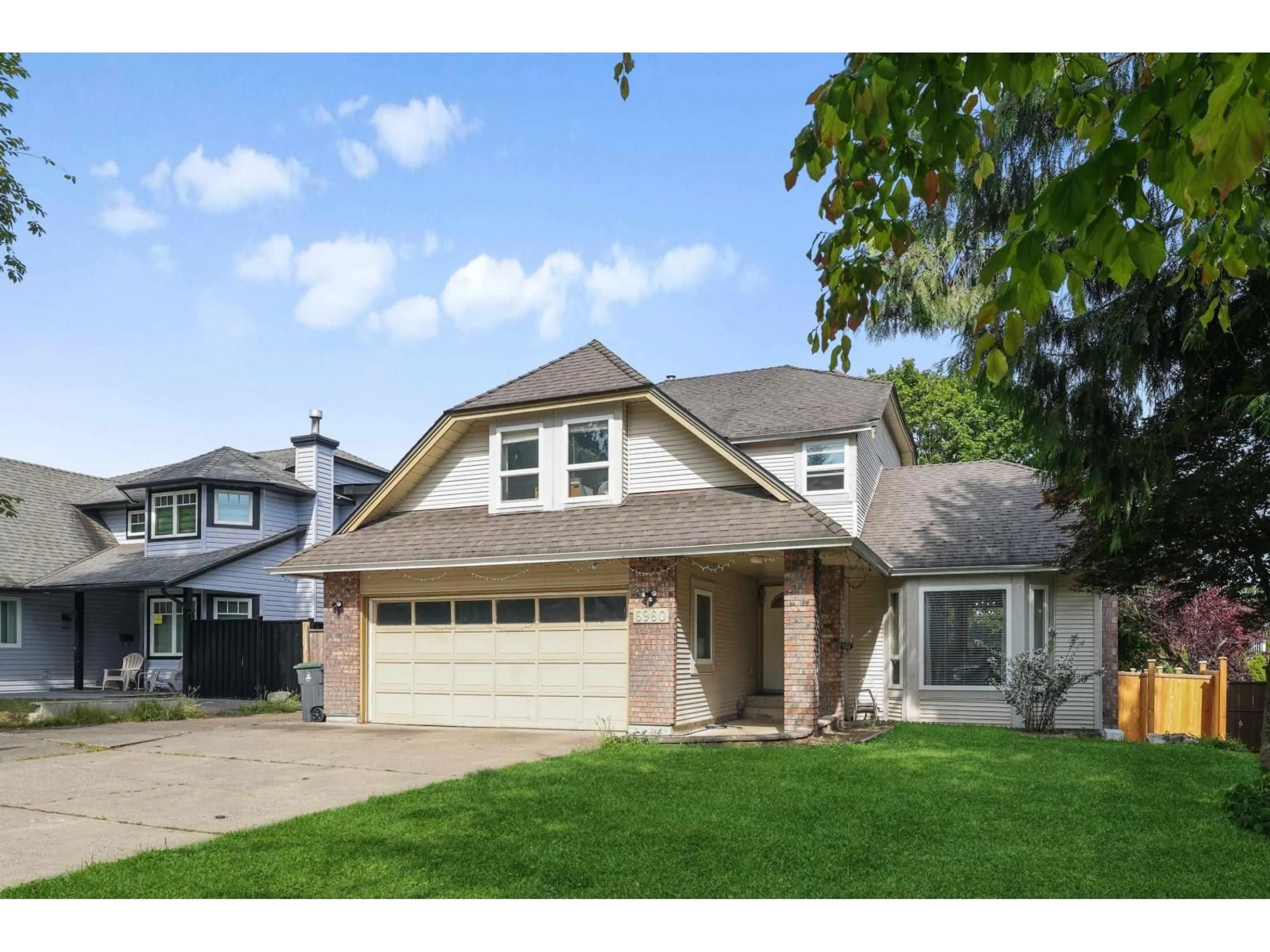 Home with vinyl exterior material, street for 6960 143A STREET, Surrey British Columbia V3W0E3