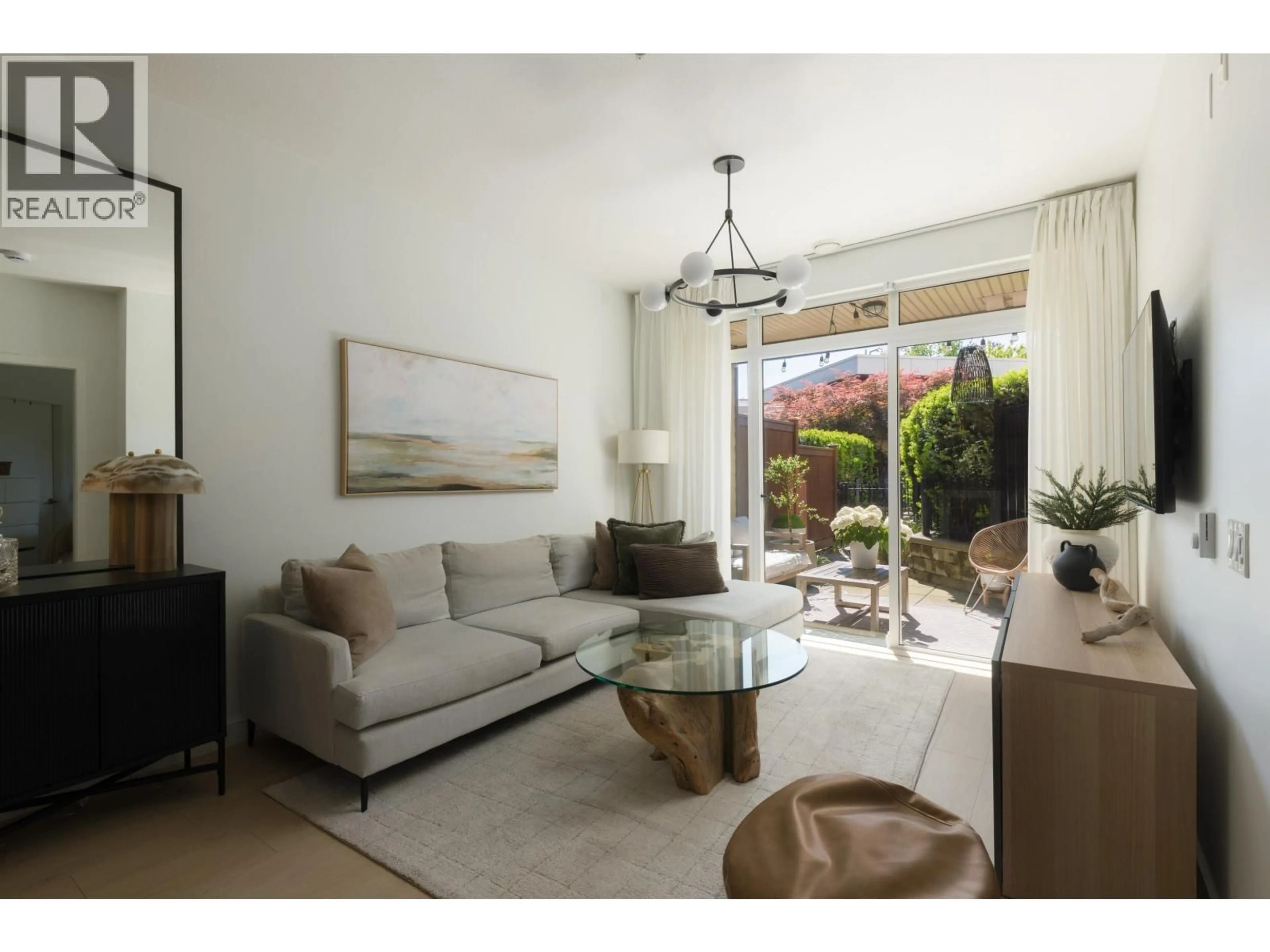 Living room with furniture, unknown for 106 - 3205 MOUNTAIN HIGHWAY, North Vancouver British Columbia V7K0A3