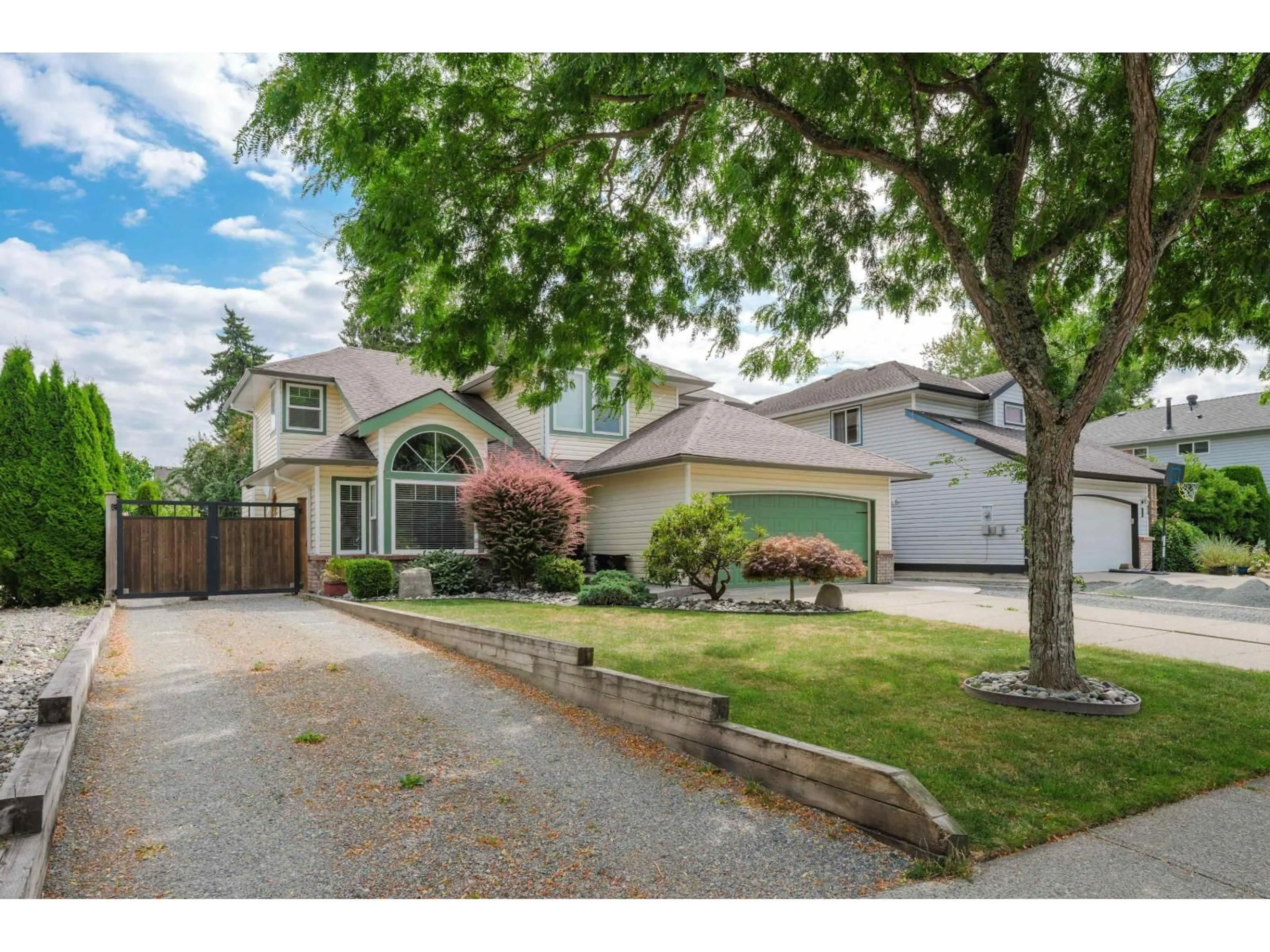 Home with vinyl exterior material, street for 6114 187A STREET, Surrey British Columbia V3S7R6