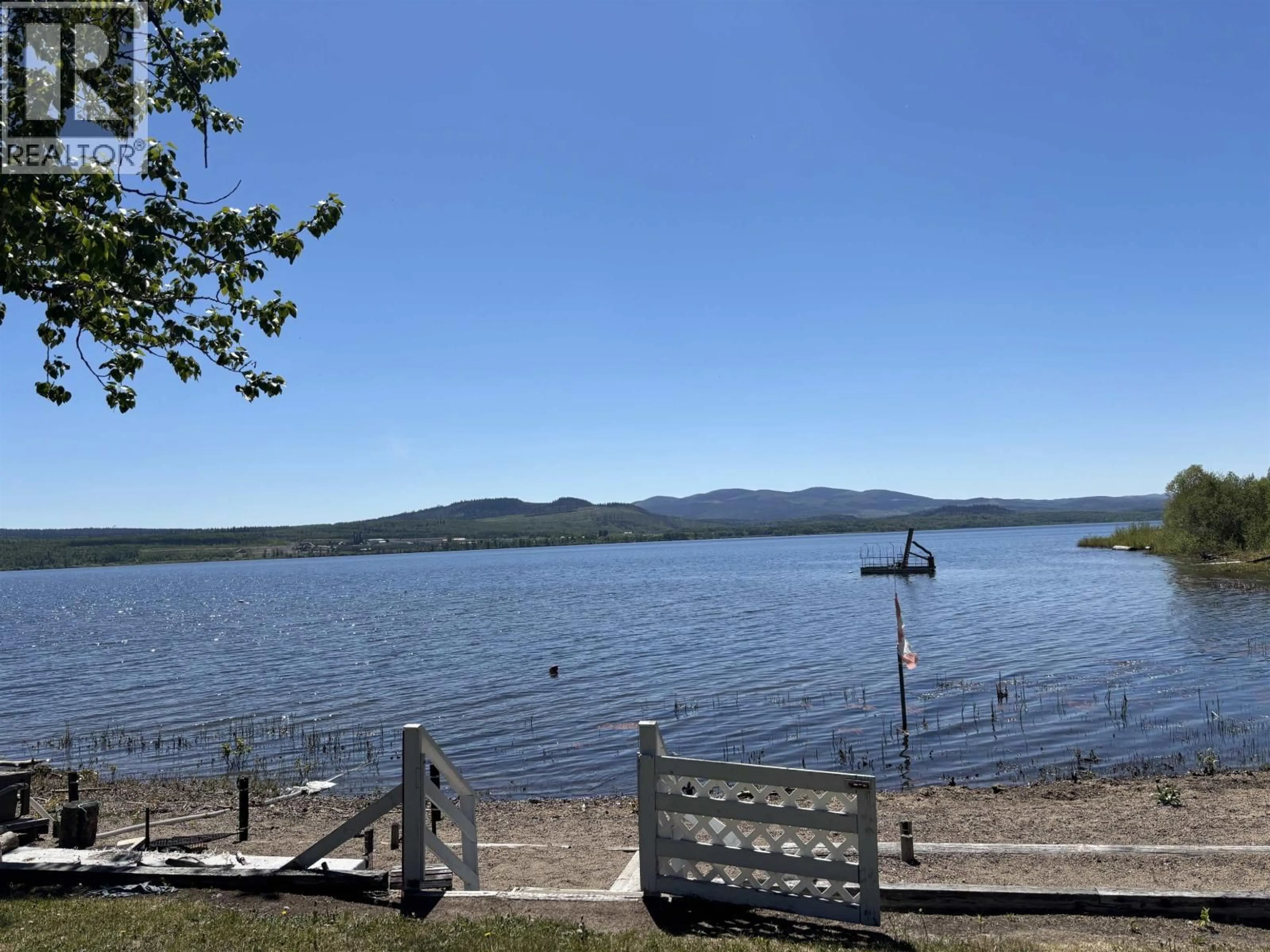 A pic from outside/outdoor area/front of a property/back of a property/a pic from drone, water/lake/river/ocean view for 7013 PETERSON ROAD, Fraser Lake British Columbia V0J1S0