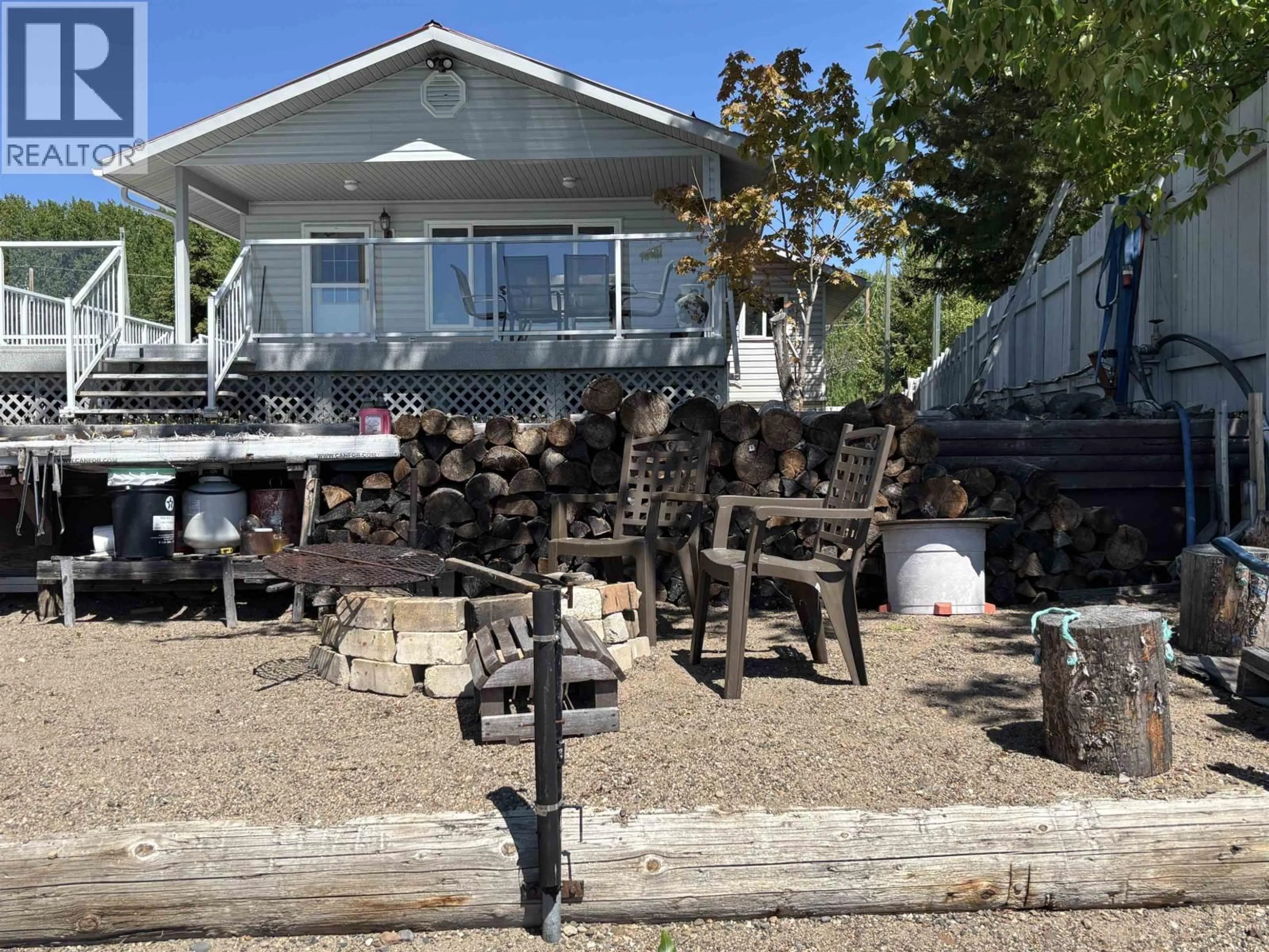 A pic from outside/outdoor area/front of a property/back of a property/a pic from drone, street for 7013 PETERSON ROAD, Fraser Lake British Columbia V0J1S0