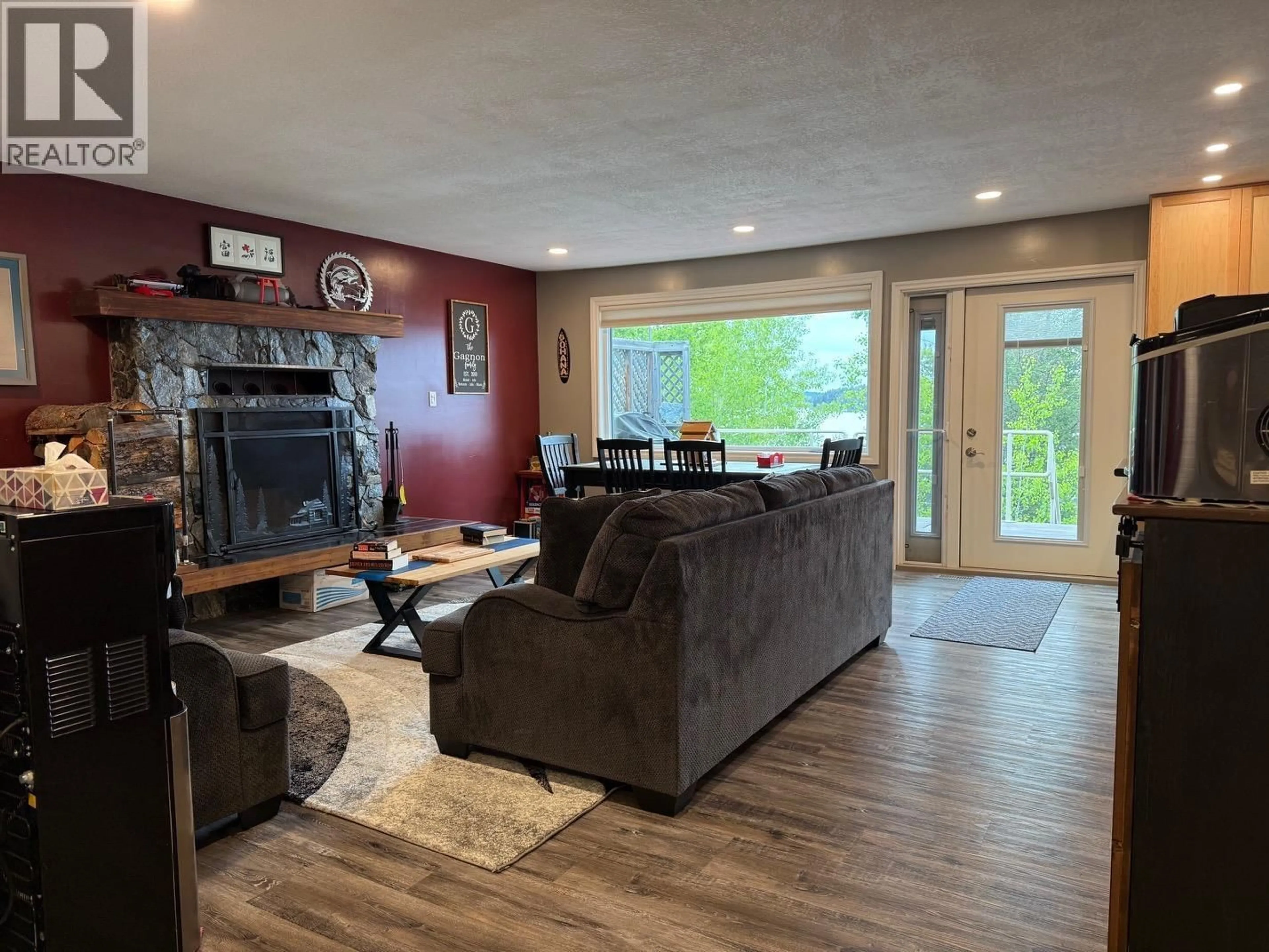 Living room with furniture, wood/laminate floor for 5230 MEIER SUB ROAD, Prince George British Columbia V0J3A3