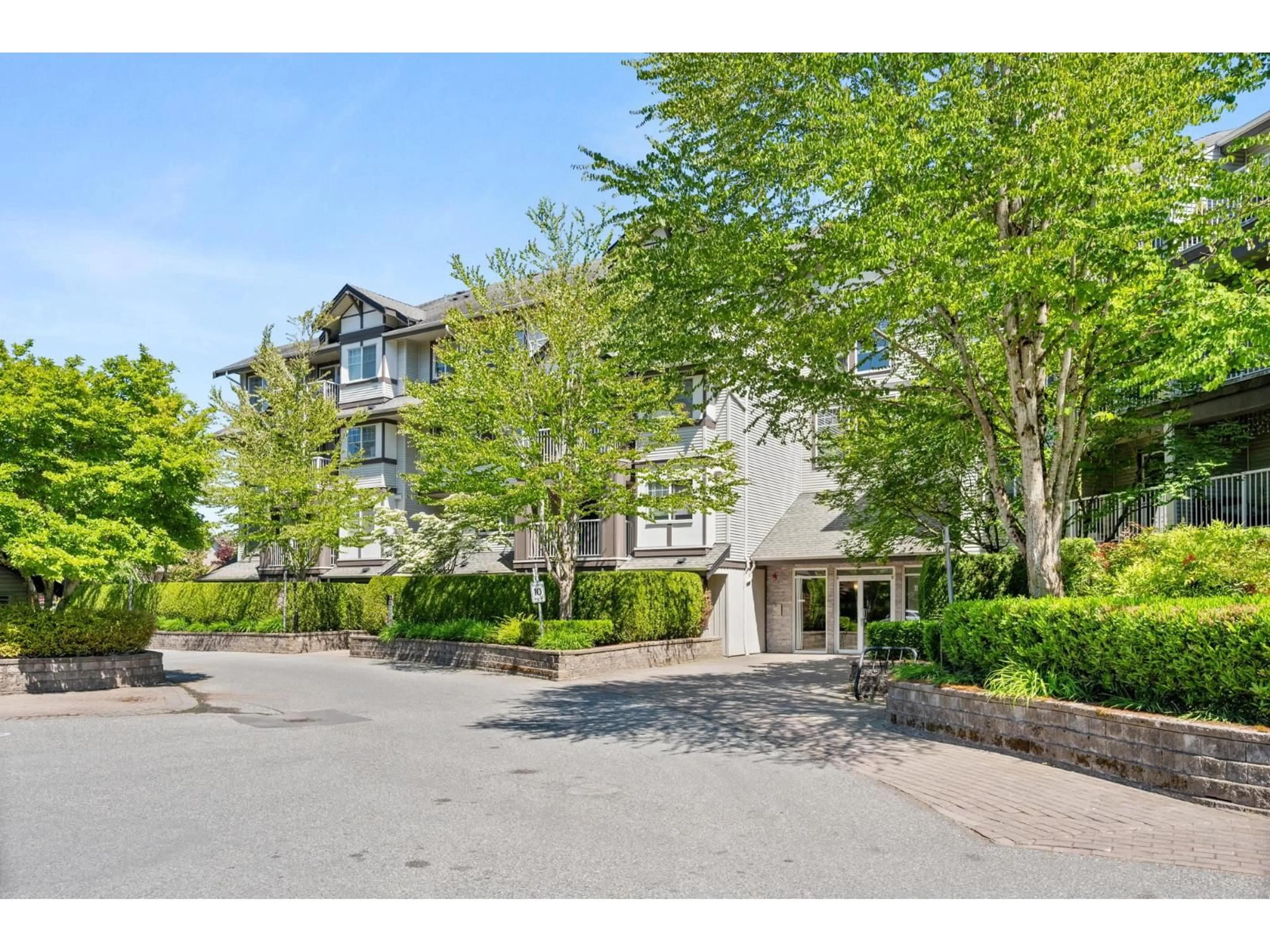 A pic from outside/outdoor area/front of a property/back of a property/a pic from drone, street for 111 - 19340 65 AVENUE, Surrey British Columbia V4N0A3