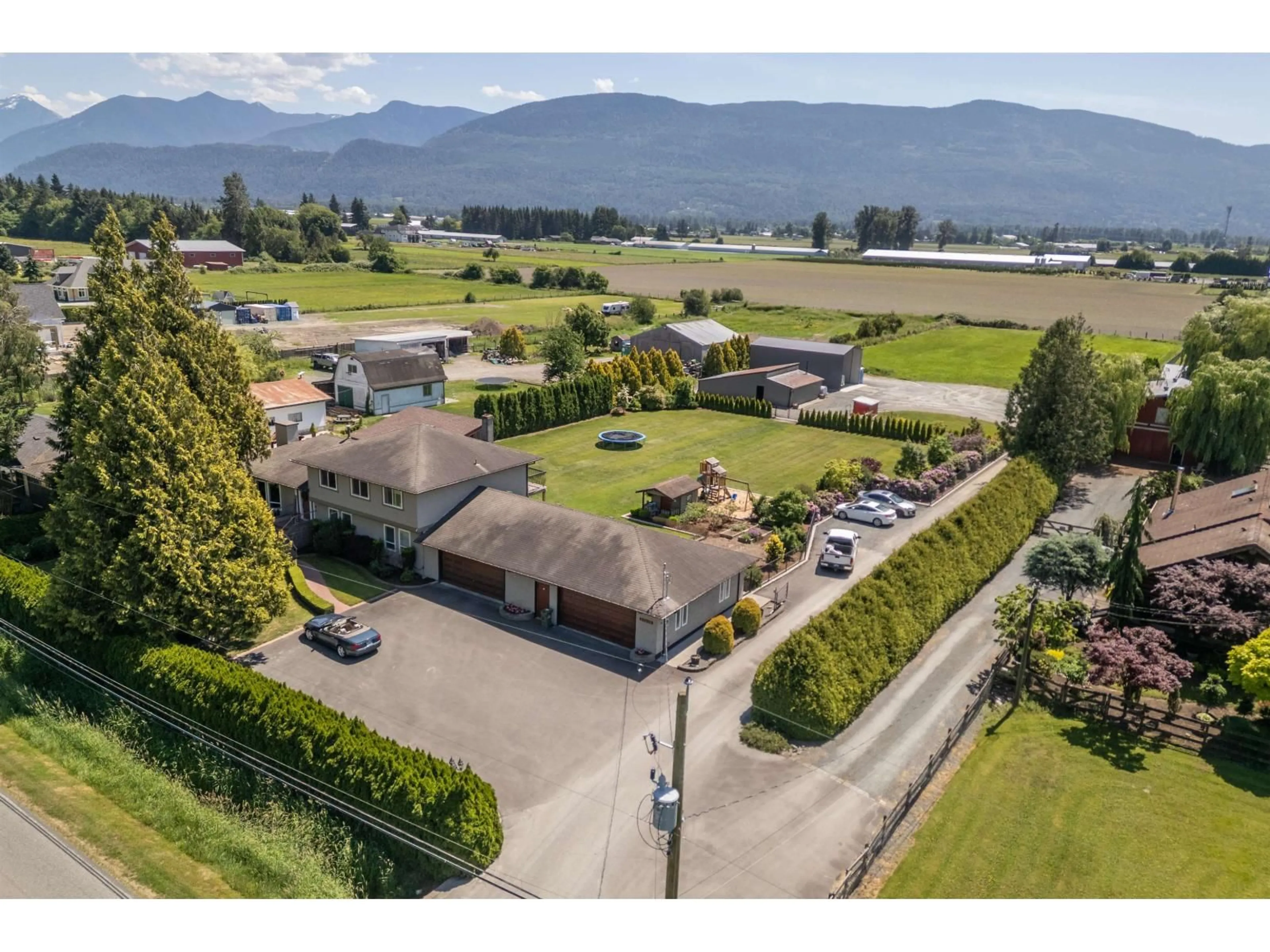 A pic from outside/outdoor area/front of a property/back of a property/a pic from drone, mountain view for 41670 SOUTH SUMAS ROAD, Sardis - Greendale British Columbia V2R4K6