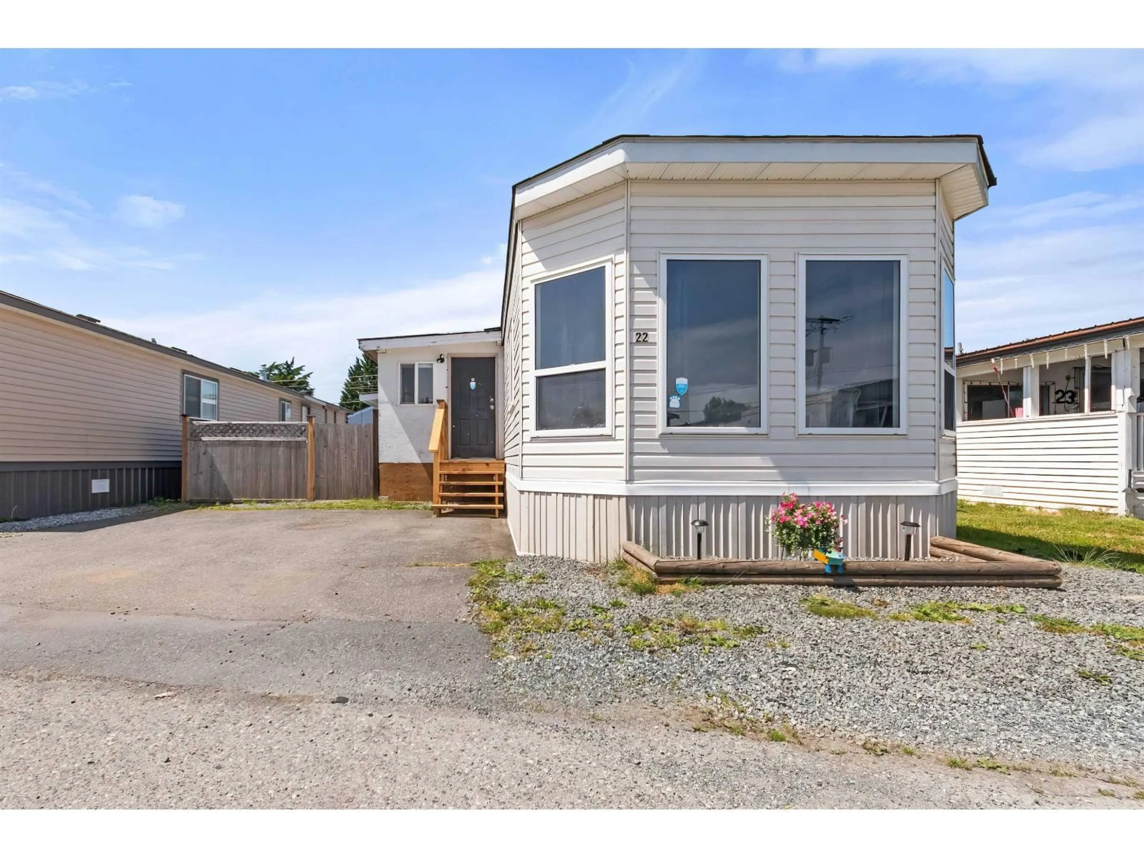 Home with vinyl exterior material, street for 22 - 26892 FRASER HIGHWAY, Langley British Columbia V4W3T5