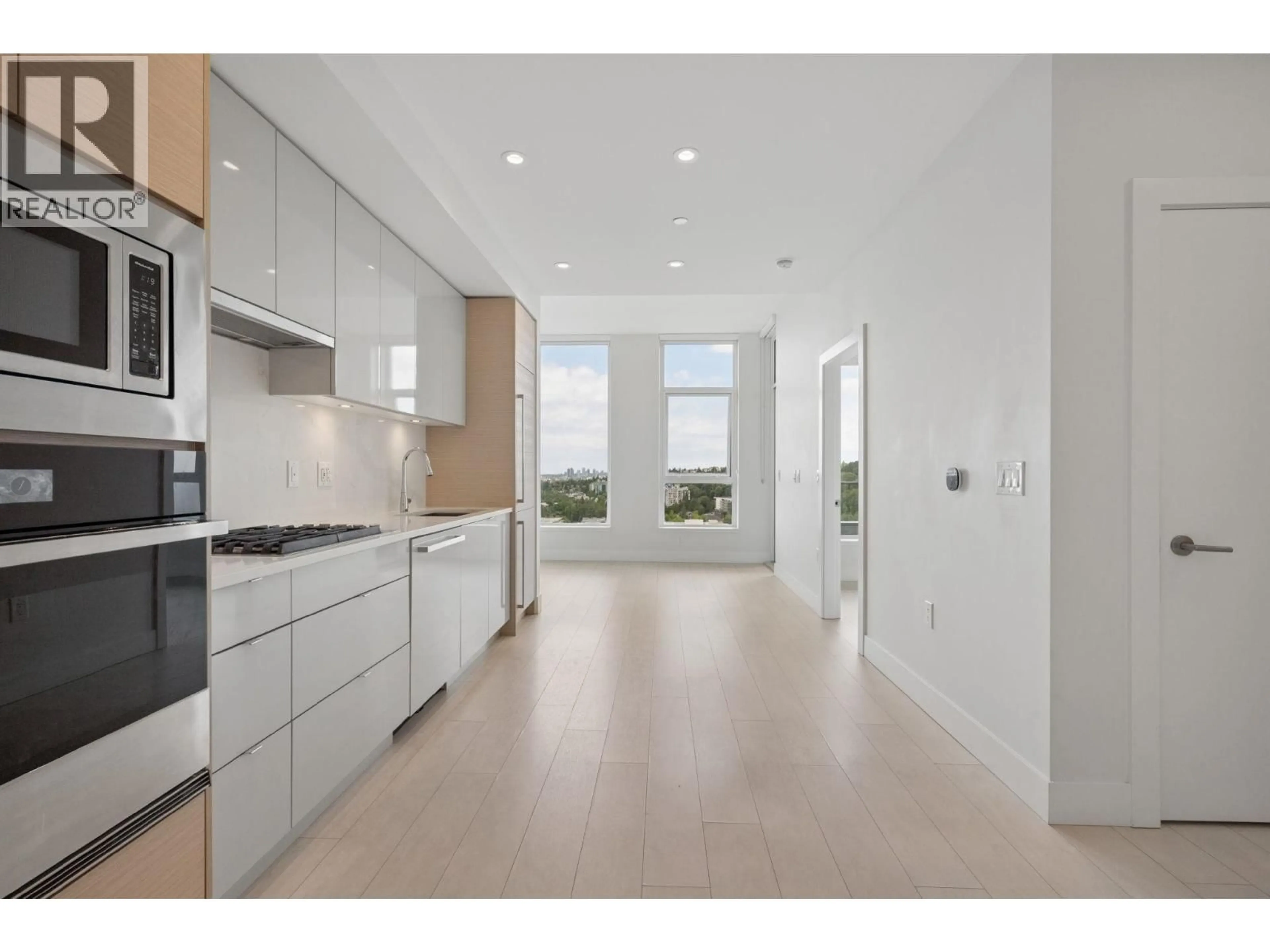 Open concept kitchen, ceramic/tile floor for 2304 - 3438 SAWMILL CRESCENT, Vancouver British Columbia V5S0E3