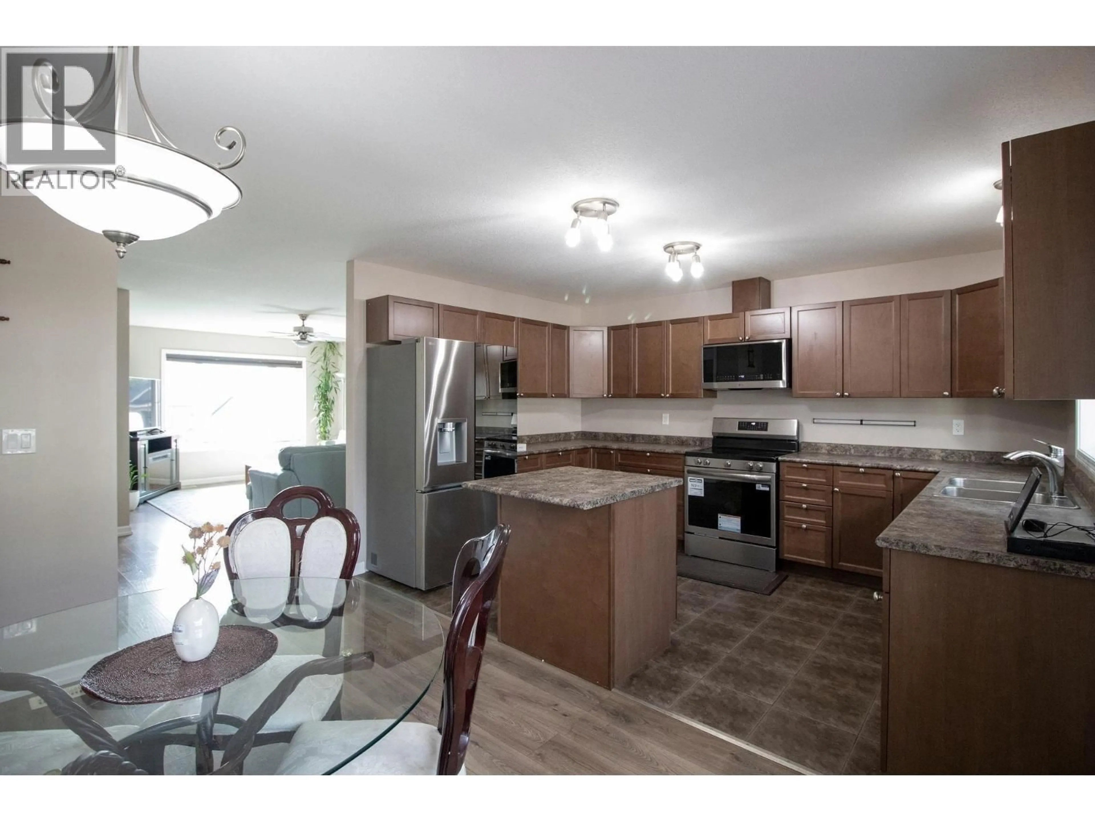 Open concept kitchen, unknown for 10711 109A STREET, Fort St. John British Columbia V1J0L2