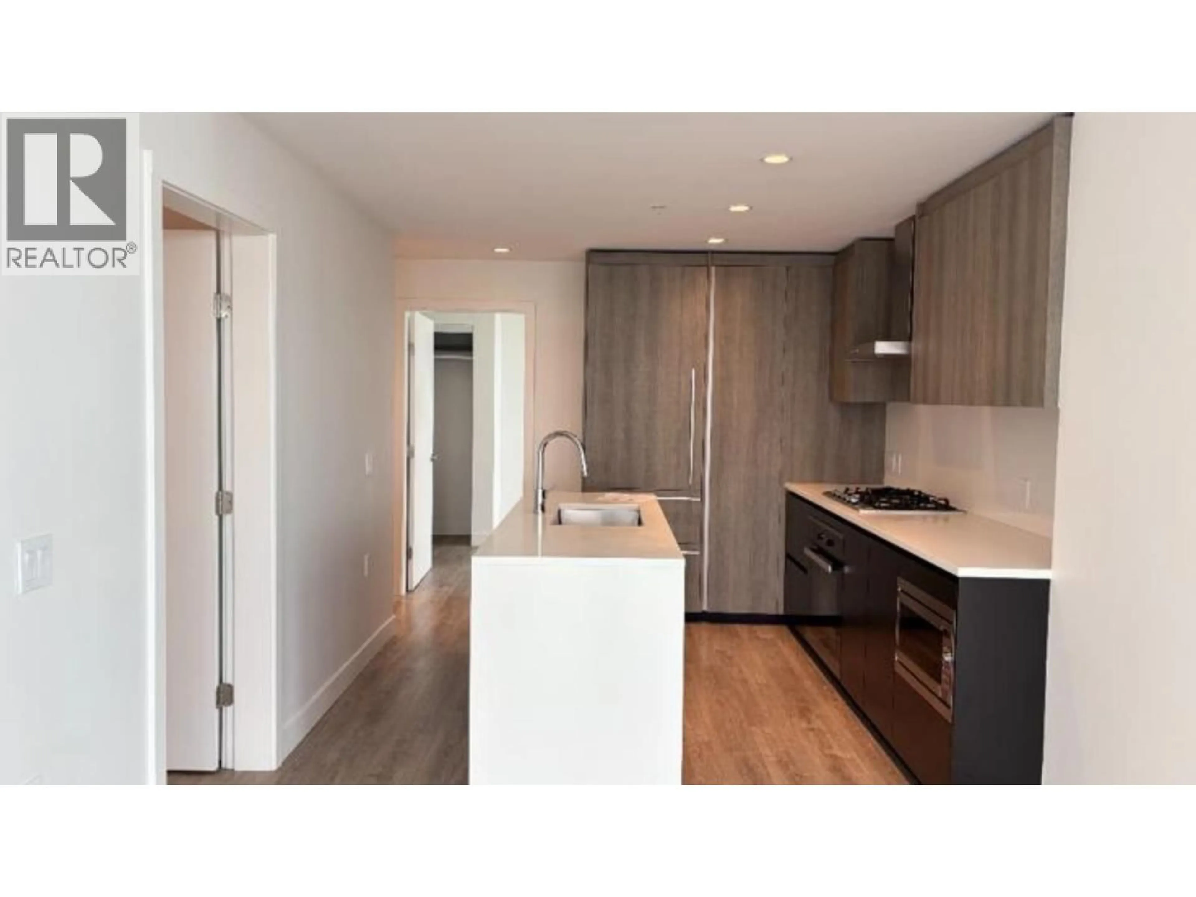 Open concept kitchen, wood/laminate floor for 1508 - 6320 NO. 3 ROAD, Richmond British Columbia V6Y0L5