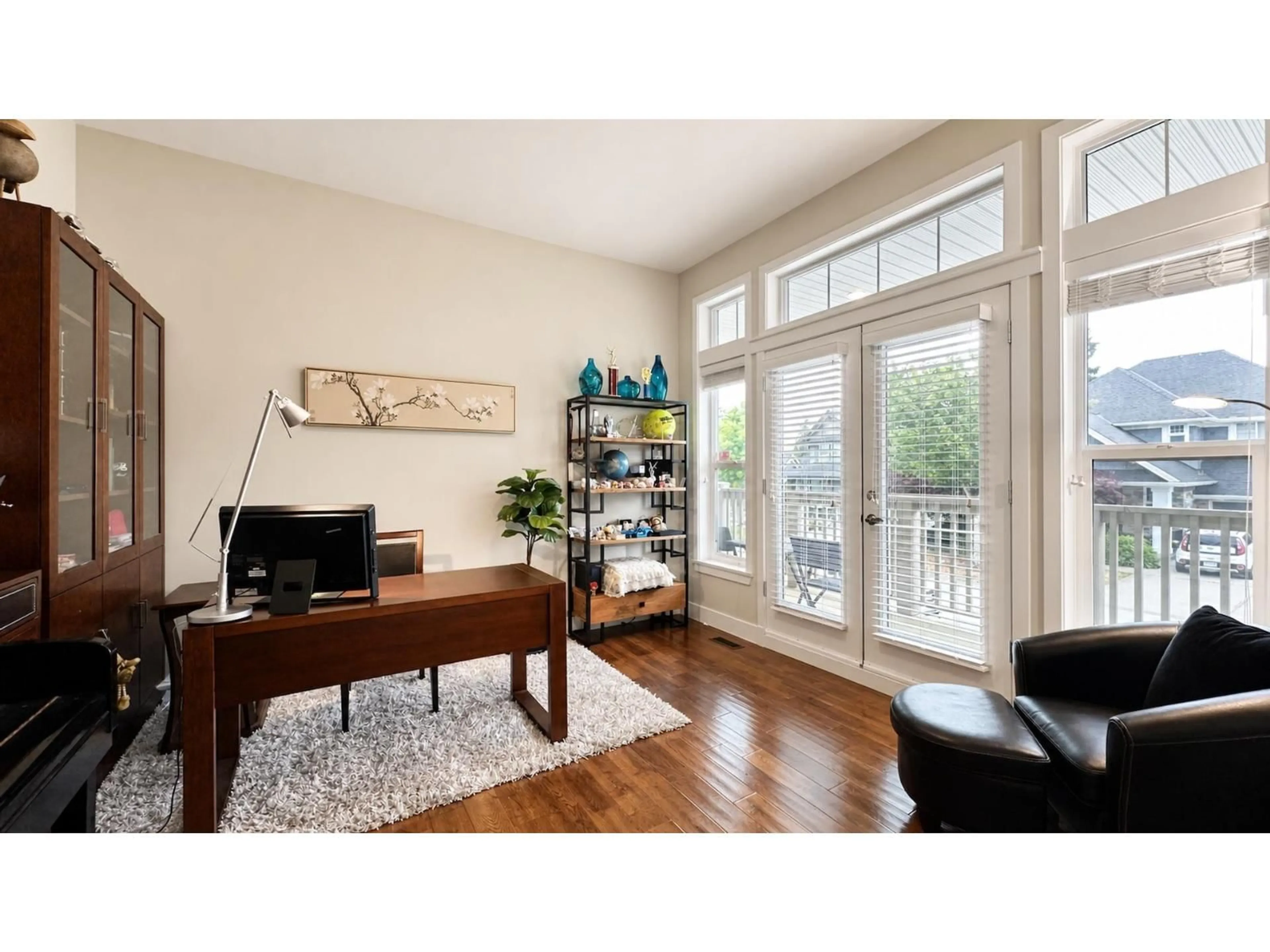 Living room with furniture, wood/laminate floor for 16162 28 A AVENUE, Surrey British Columbia V3Z3Y6