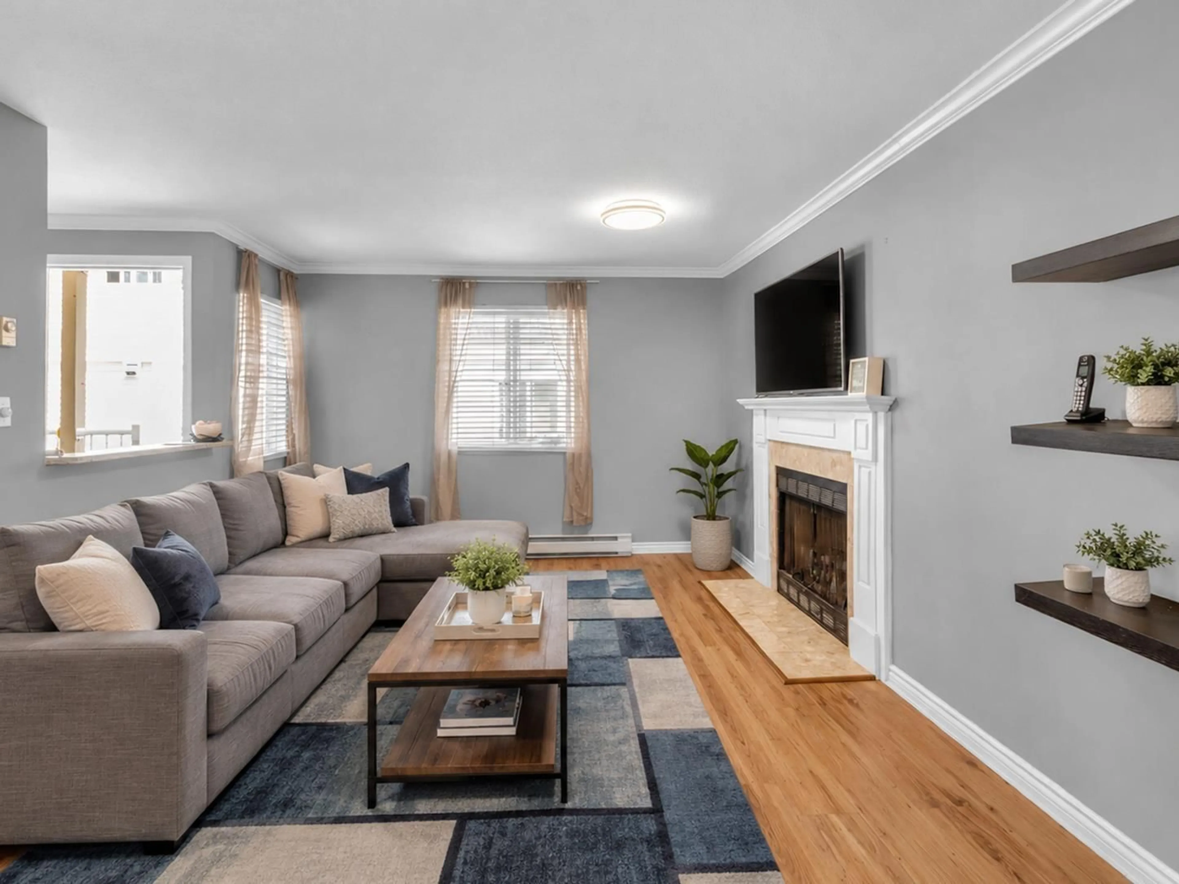 Living room with furniture, wood/laminate floor for 186 - 10077 156 STREET, Surrey British Columbia V3R4L6