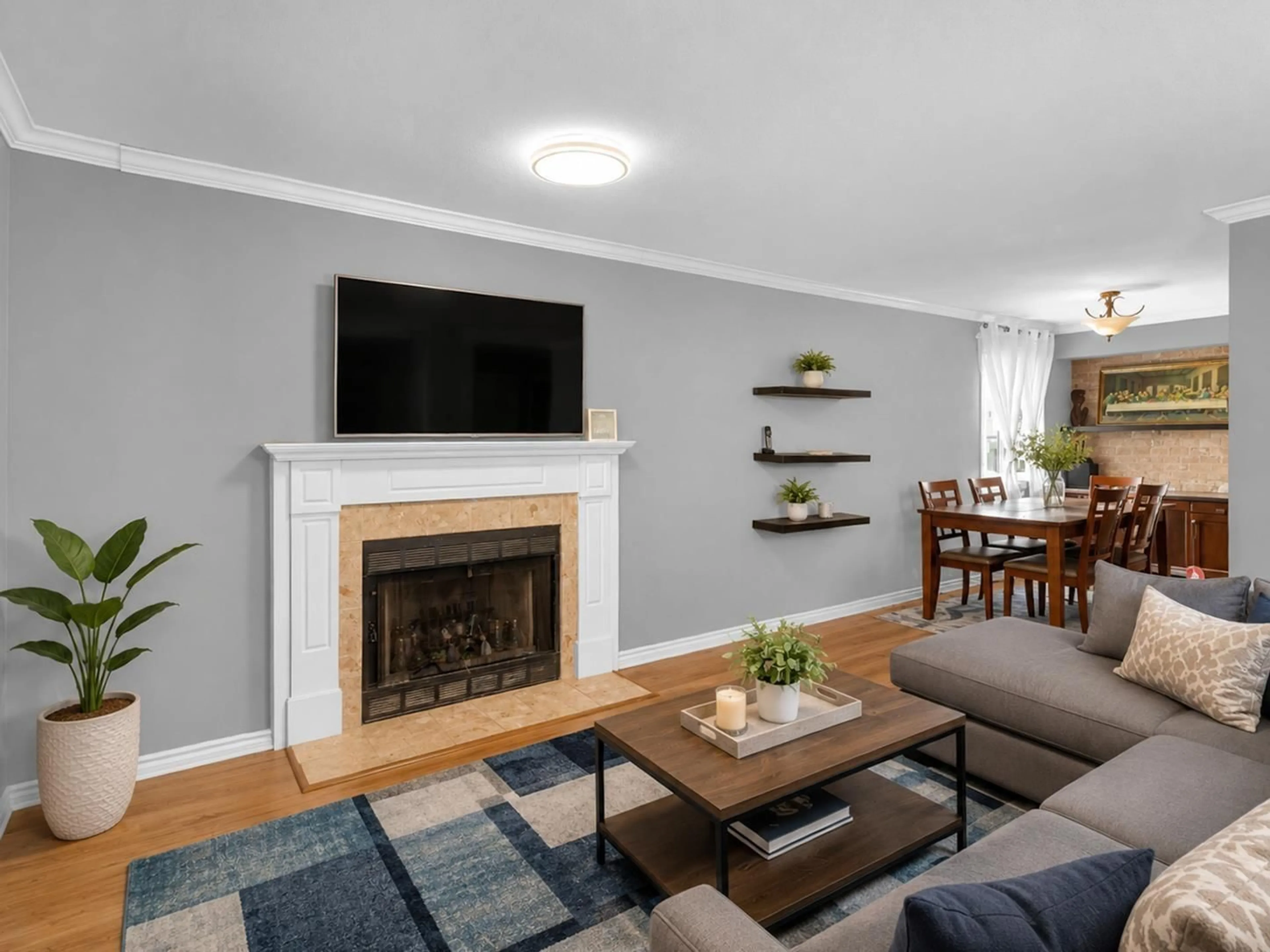 Living room with furniture, wood/laminate floor for 186 - 10077 156 STREET, Surrey British Columbia V3R4L6