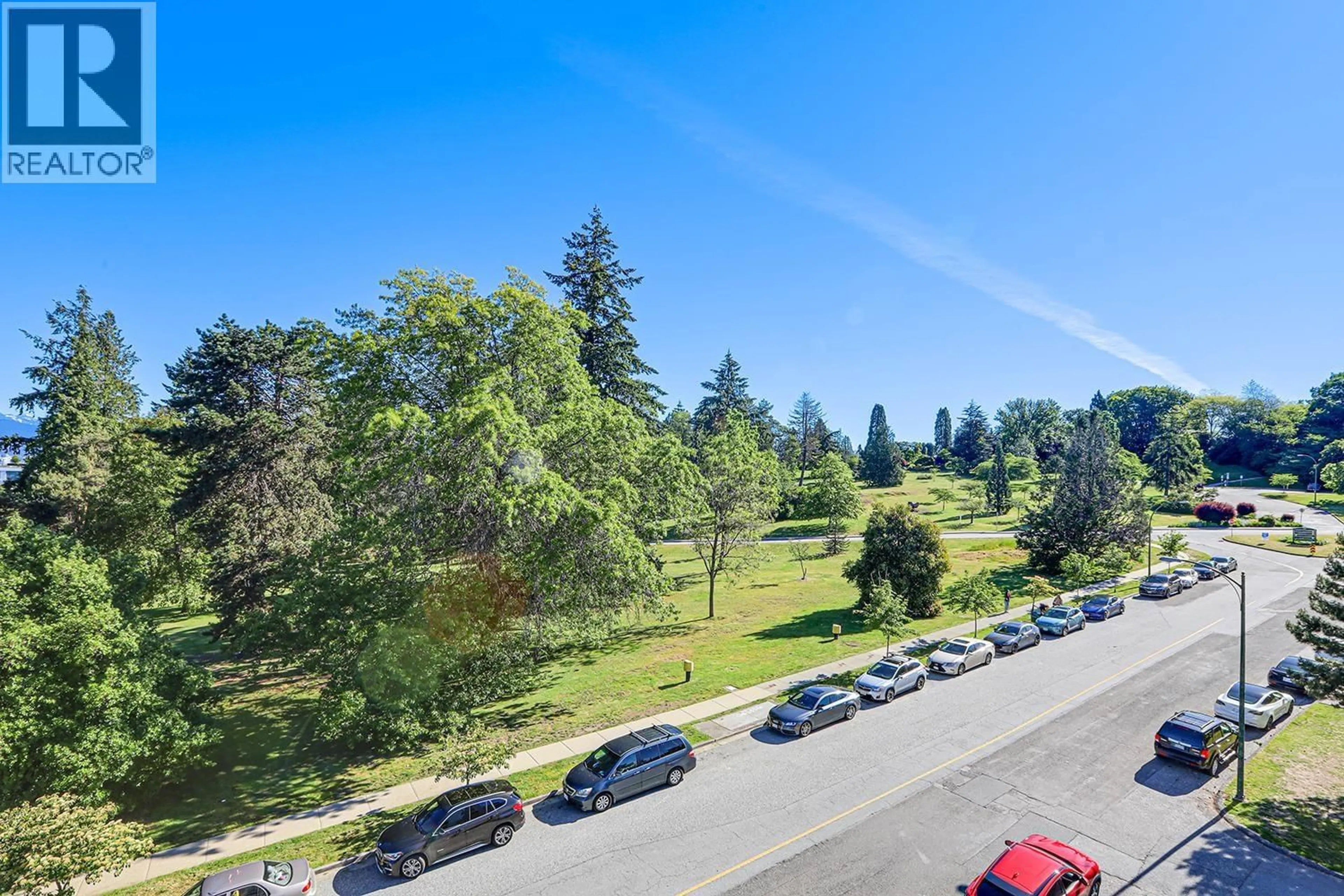 A pic from outside/outdoor area/front of a property/back of a property/a pic from drone, forest/trees view for 404 - 4908 CAMBIE STREET, Vancouver British Columbia V5Z0K1