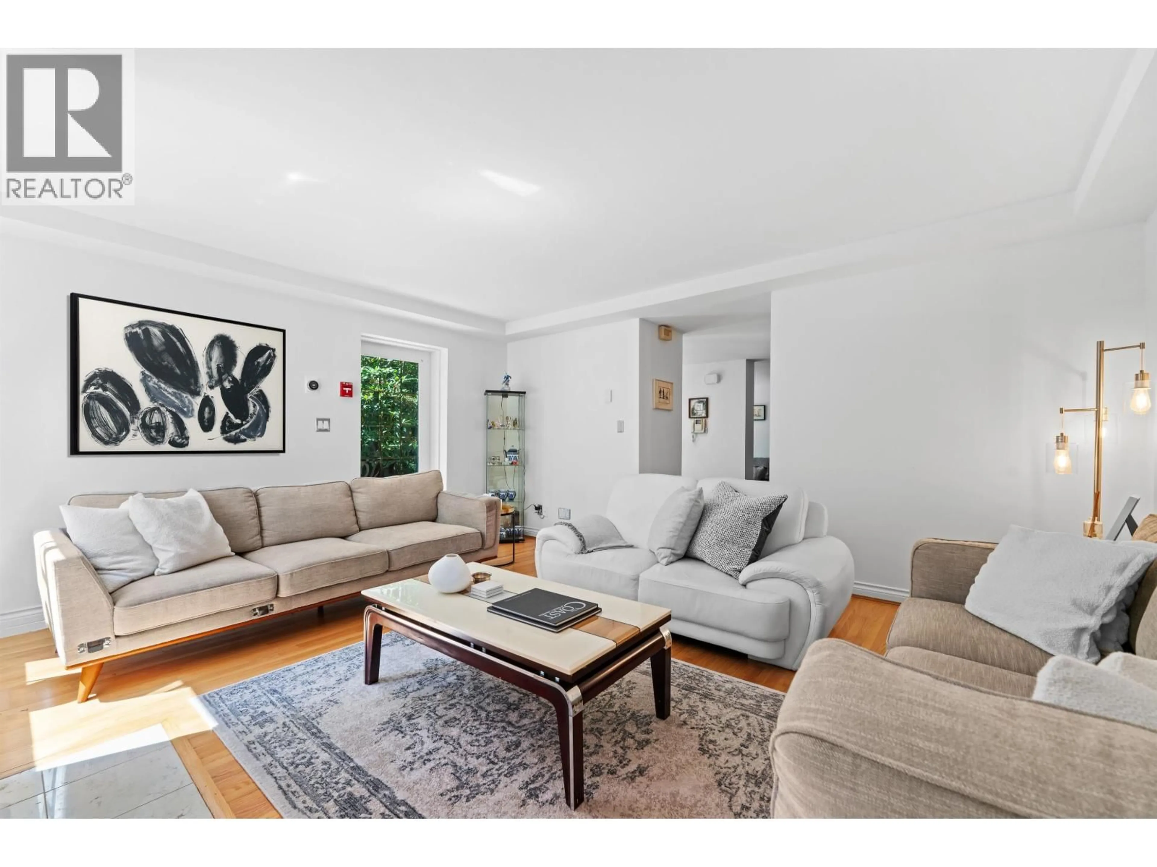 Living room with furniture, unknown for 102 - 2128 43RD AVENUE, Vancouver British Columbia V6M2E1