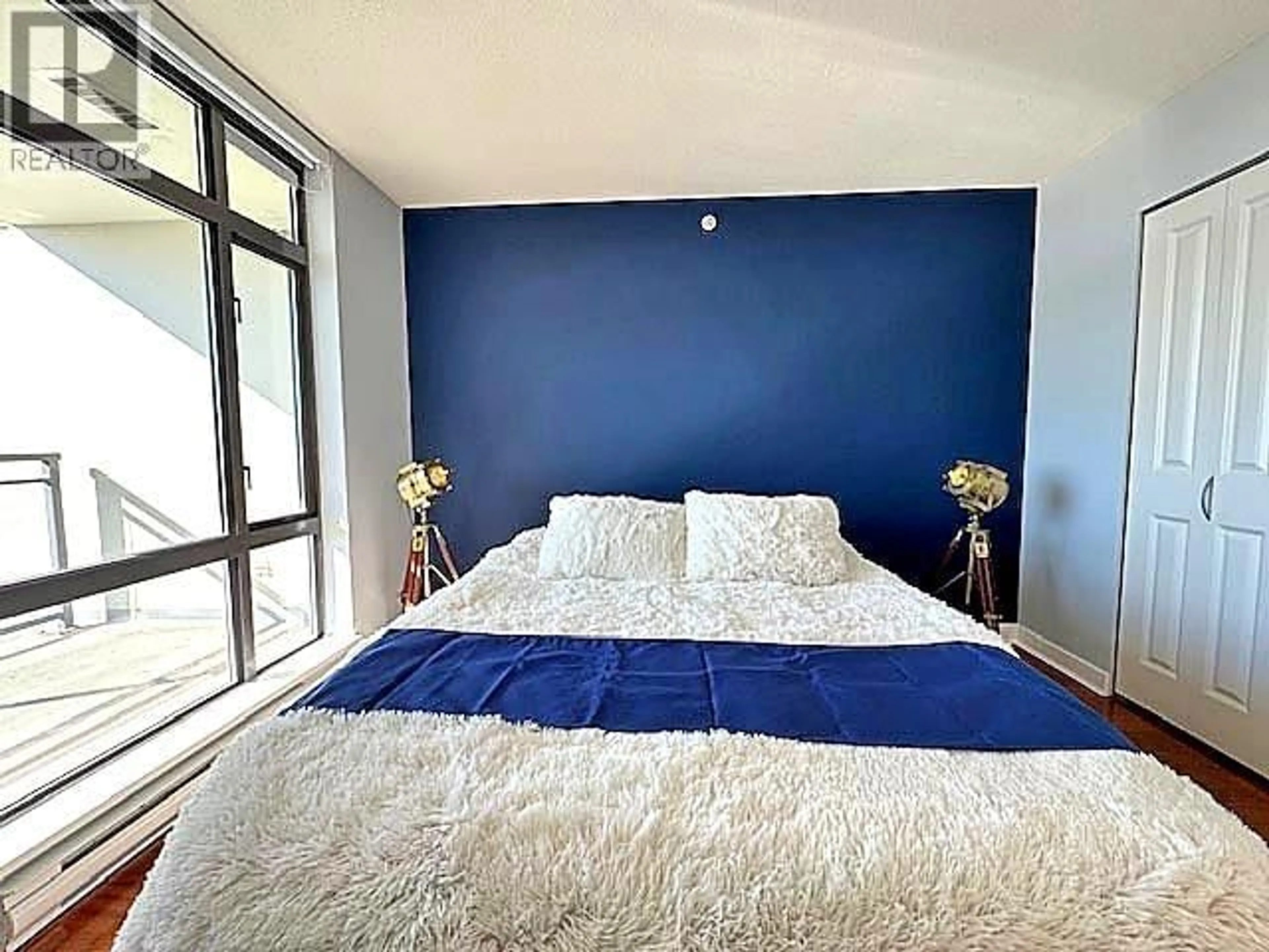 Bedroom with bed, unknown for 1401 - 3660 VANNESS AVENUE, Vancouver British Columbia V5R6H8