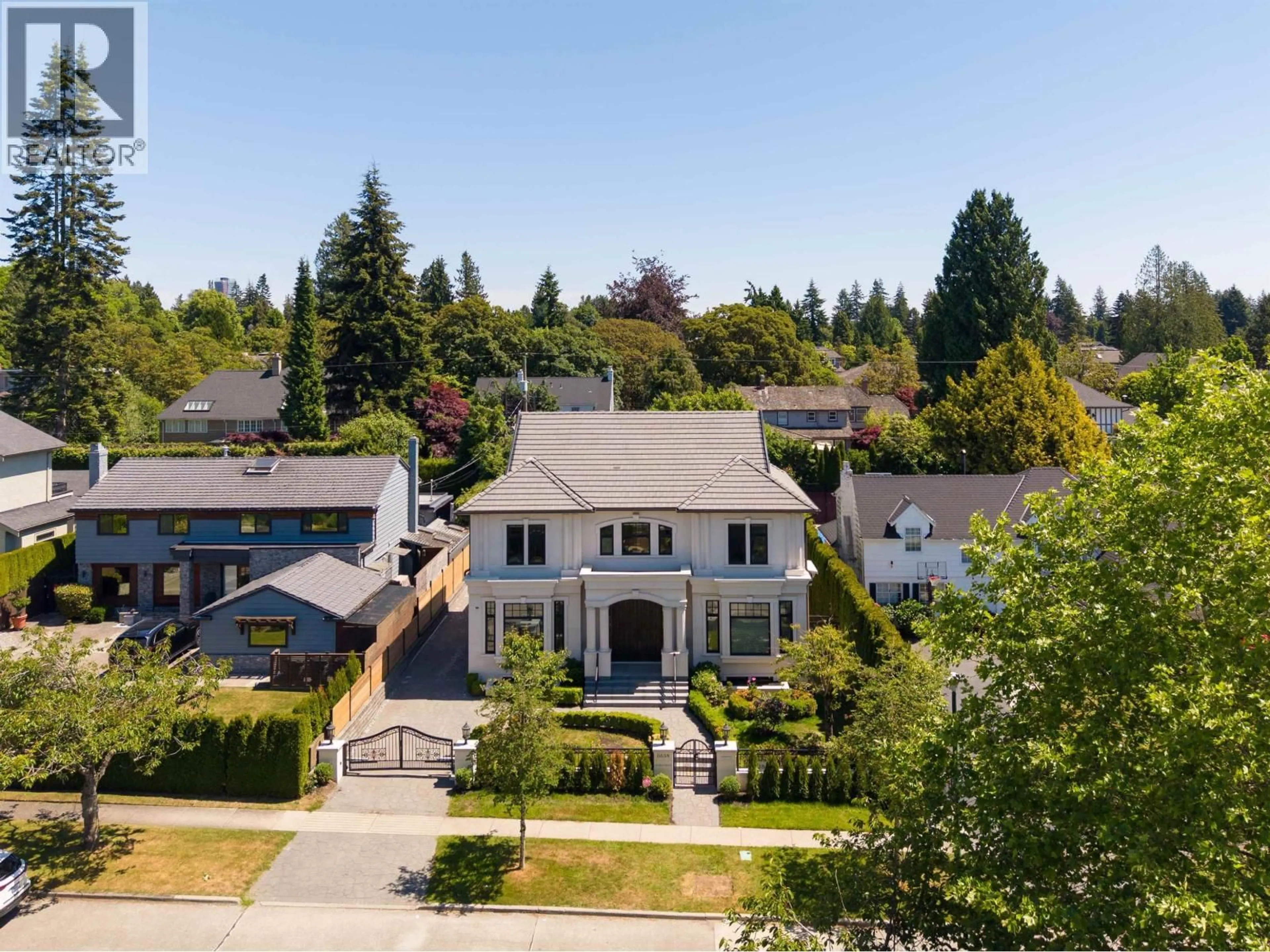 A pic from outside/outdoor area/front of a property/back of a property/a pic from drone, street for 6638 MARGUERITE STREET, Vancouver British Columbia V6P5E9
