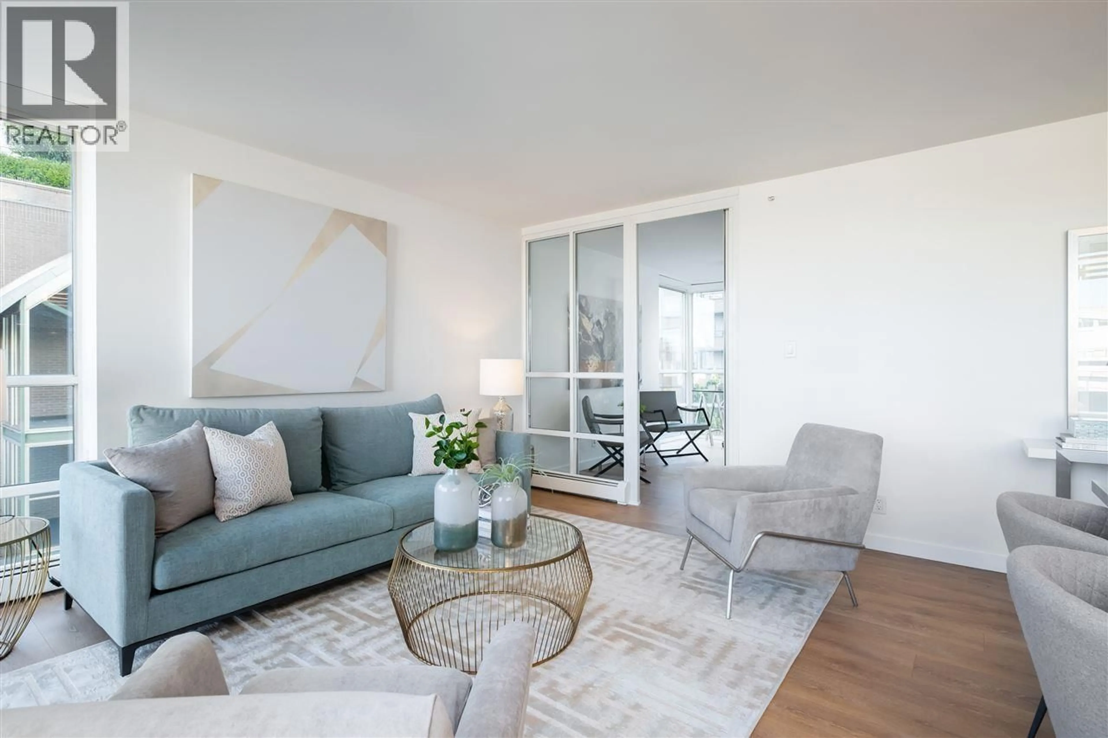 Living room with furniture, unknown for 605 - 1228 MARINASIDE CRESCENT, Vancouver British Columbia V6Z2W4