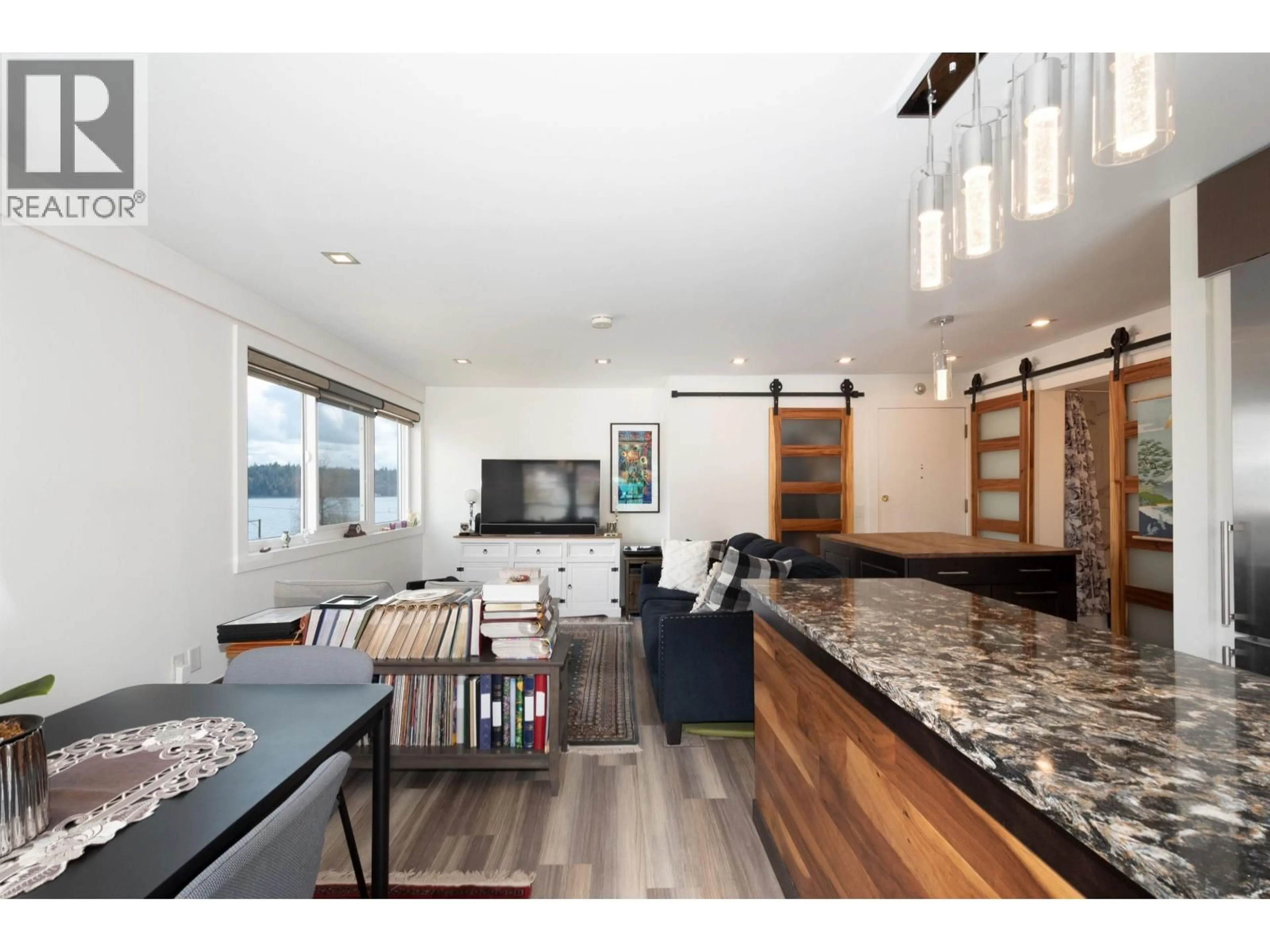 Open concept kitchen, wood/laminate floor for 303 - 1845 BELLEVUE AVENUE, West Vancouver British Columbia V7V1B2