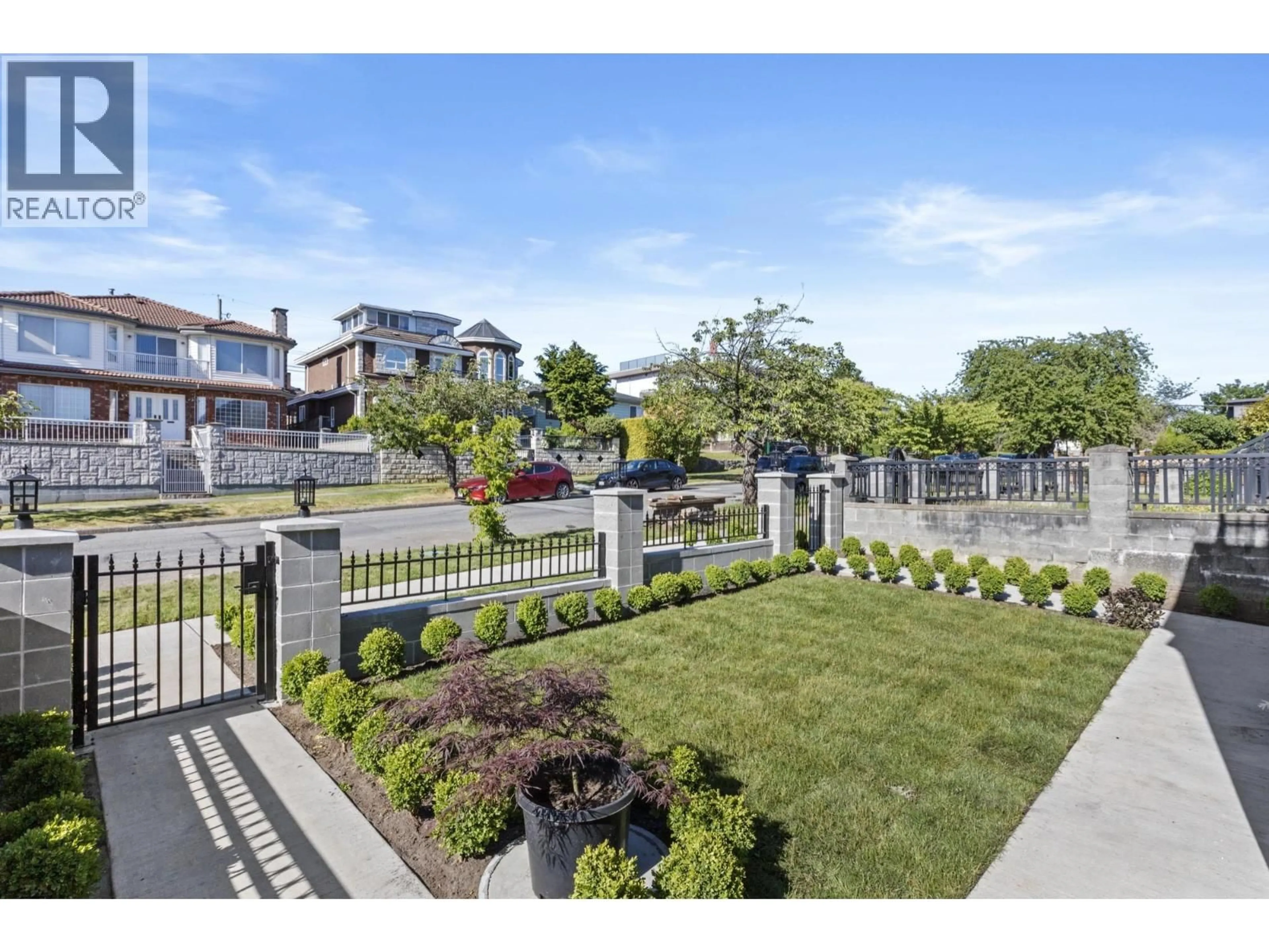 A pic from outside/outdoor area/front of a property/back of a property/a pic from drone, street for 134 63RD AVENUE, Vancouver British Columbia V5X2J6