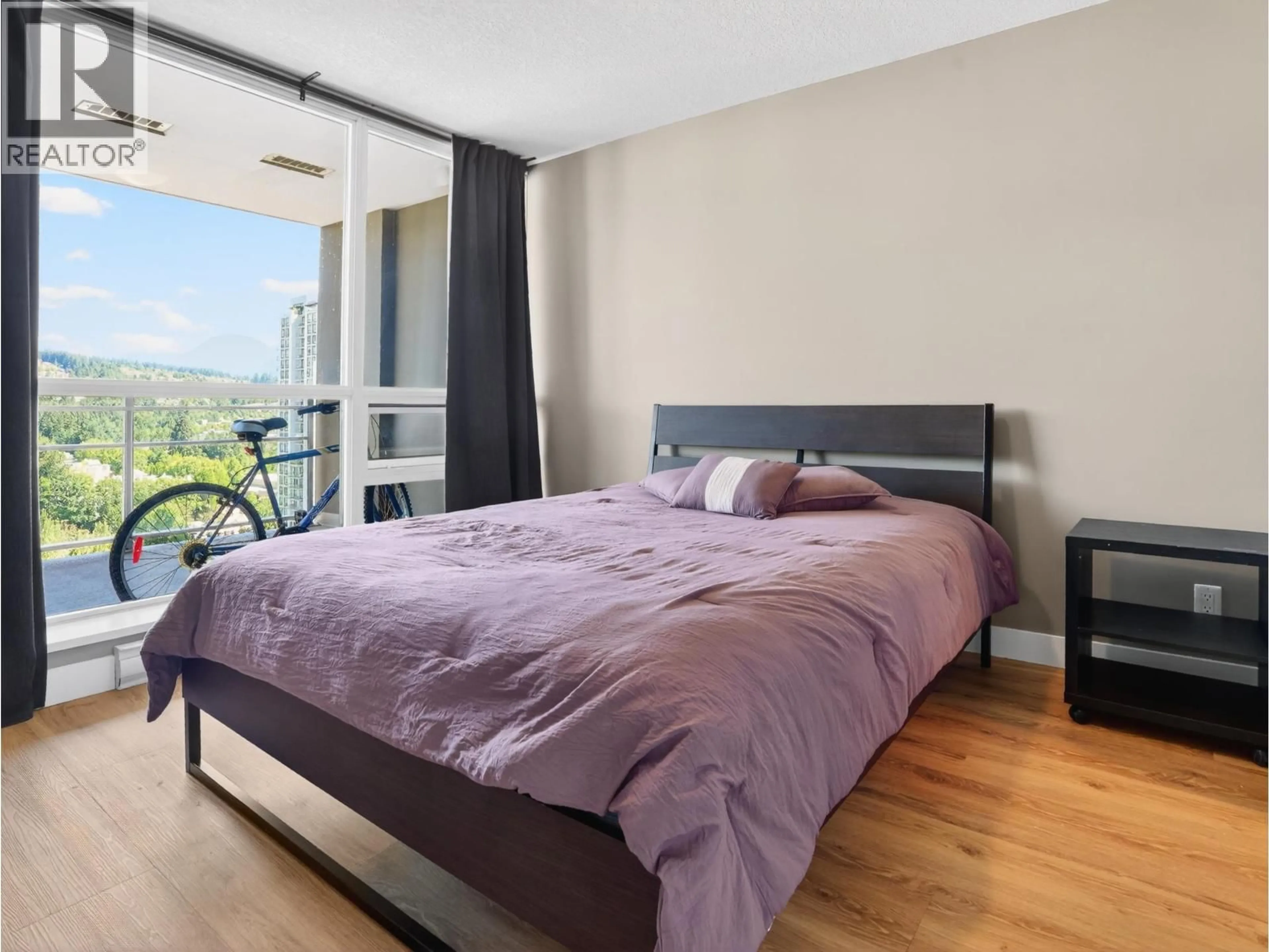 Bedroom with bed, wood/laminate floor for 2102 - 2978 GLEN DRIVE, Coquitlam British Columbia V3B0C3