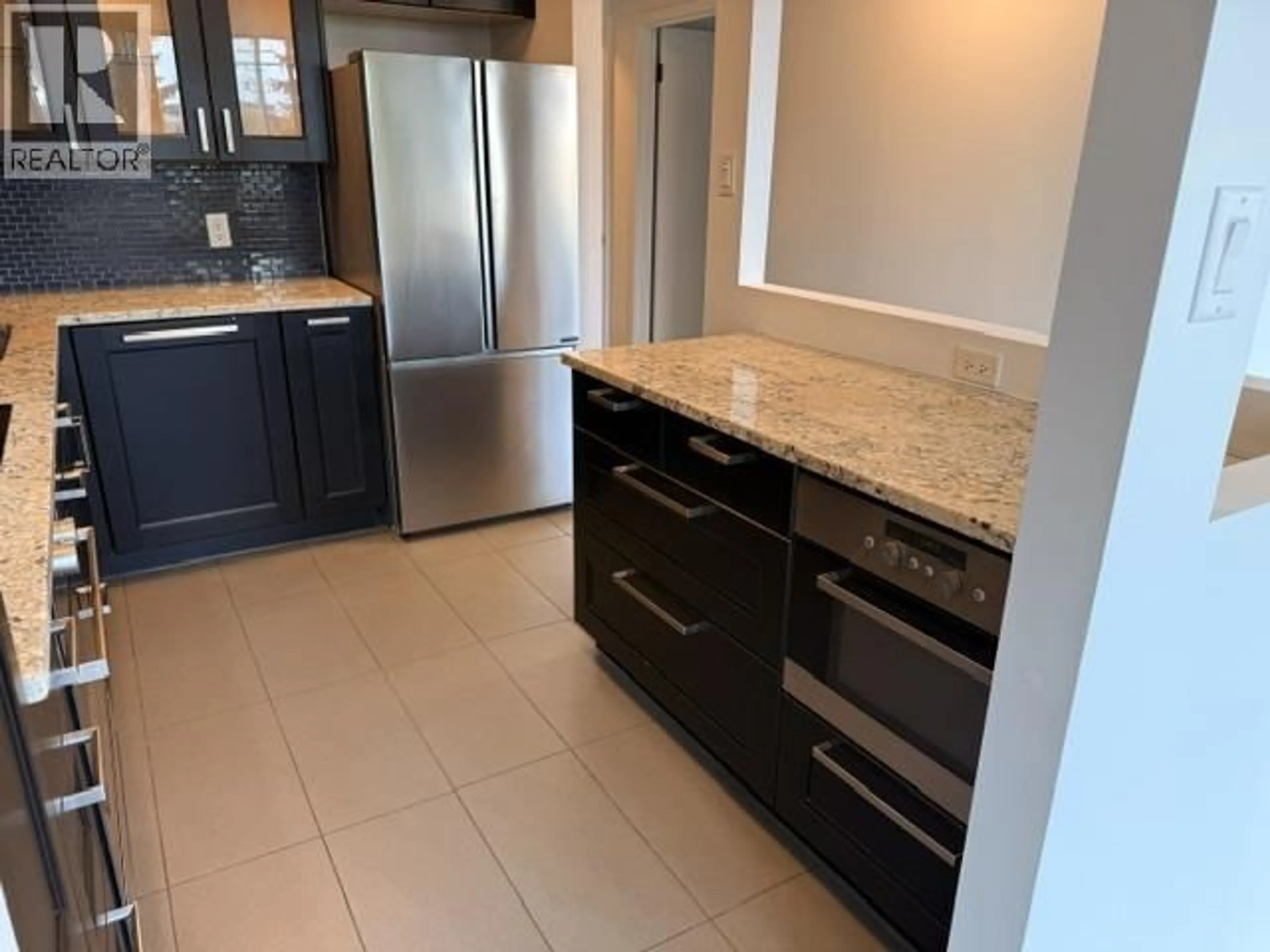 Open concept kitchen, ceramic/tile floor for 303 - 6540 BURLINGTON AVENUE, Burnaby British Columbia V5H4G3