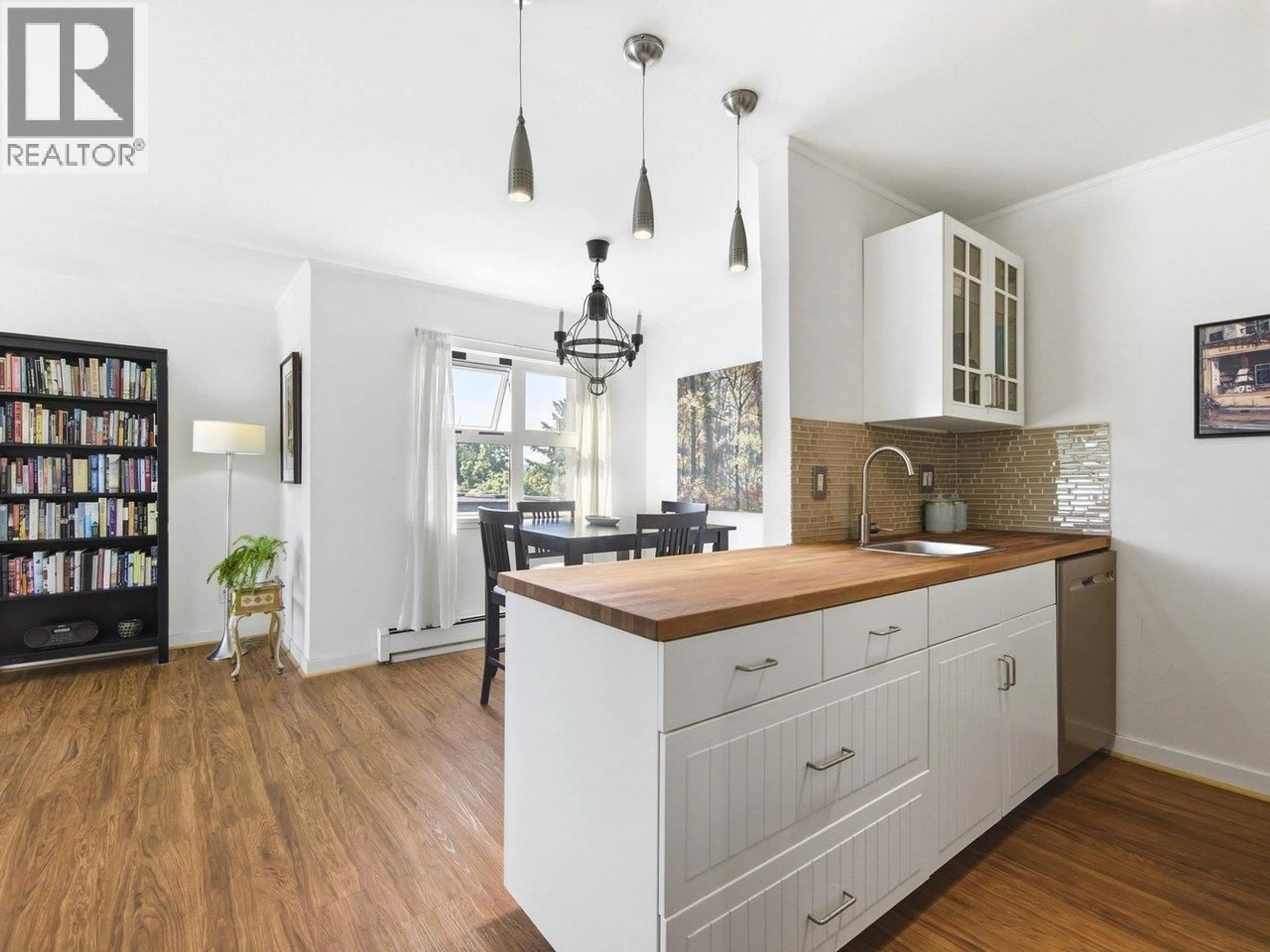 Open concept kitchen, wood/laminate floor for 403 - 570 8TH AVENUE, Vancouver British Columbia V5T1S8
