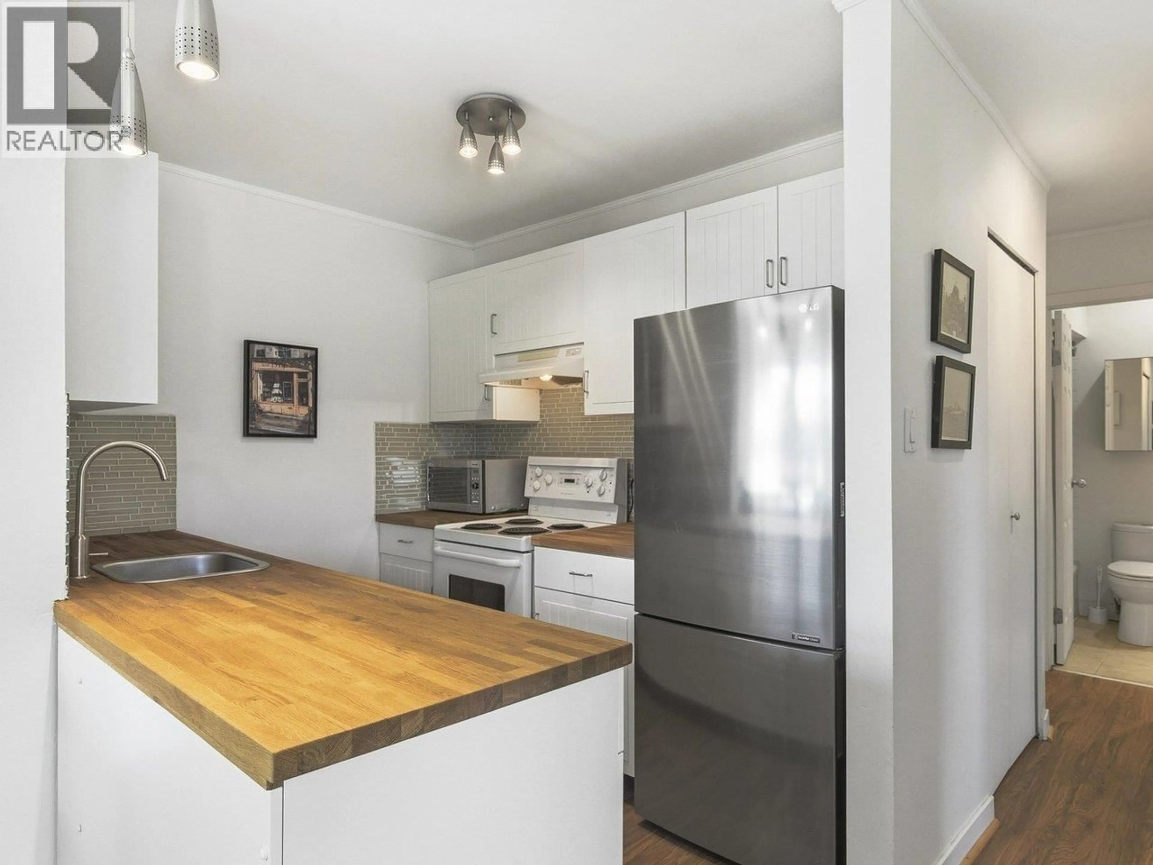 Standard kitchen, wood/laminate floor for 403 - 570 8TH AVENUE, Vancouver British Columbia V5T1S8