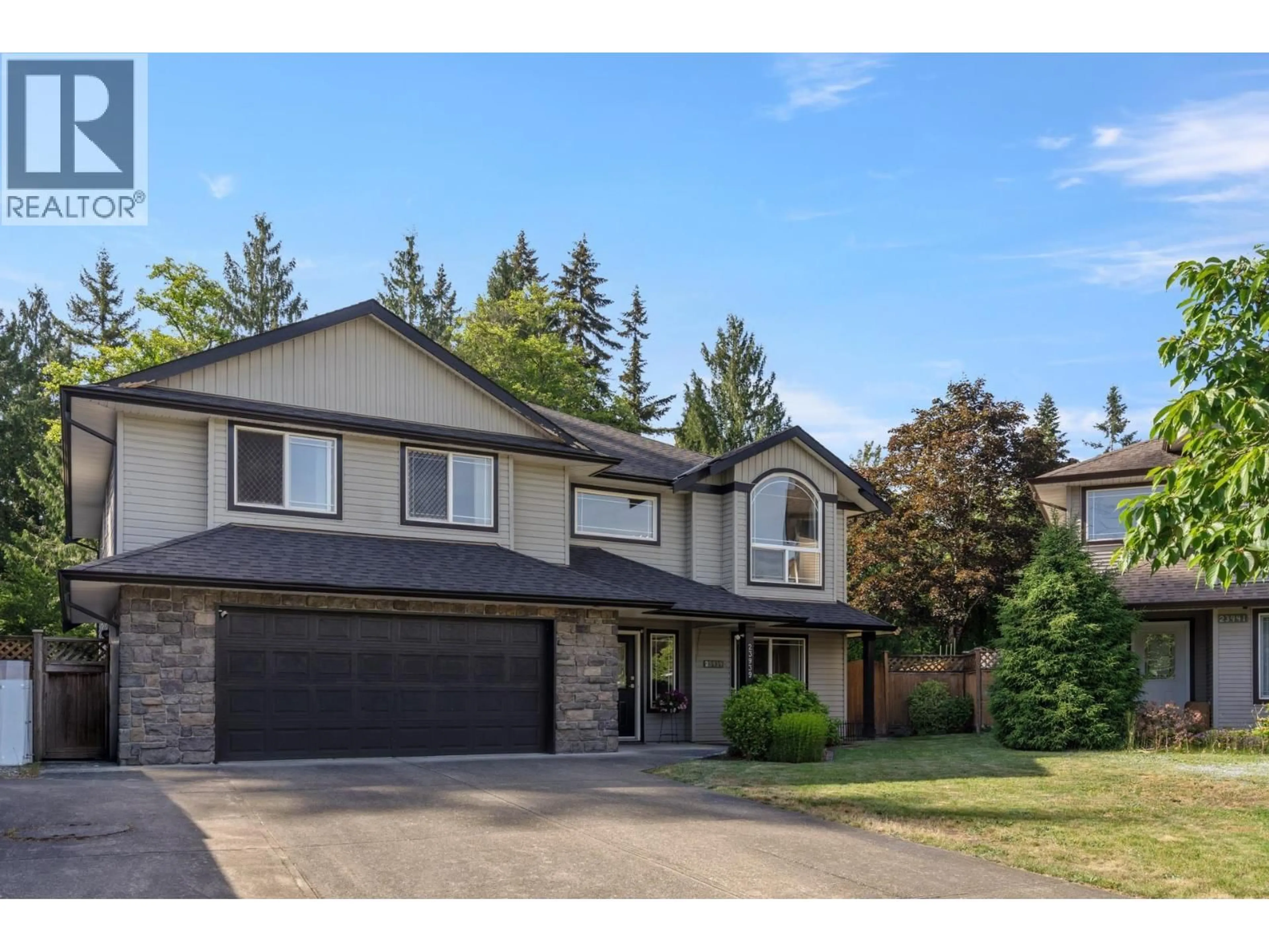 Home with vinyl exterior material, street for 23939 115 AVENUE, Maple Ridge British Columbia V2W1X2