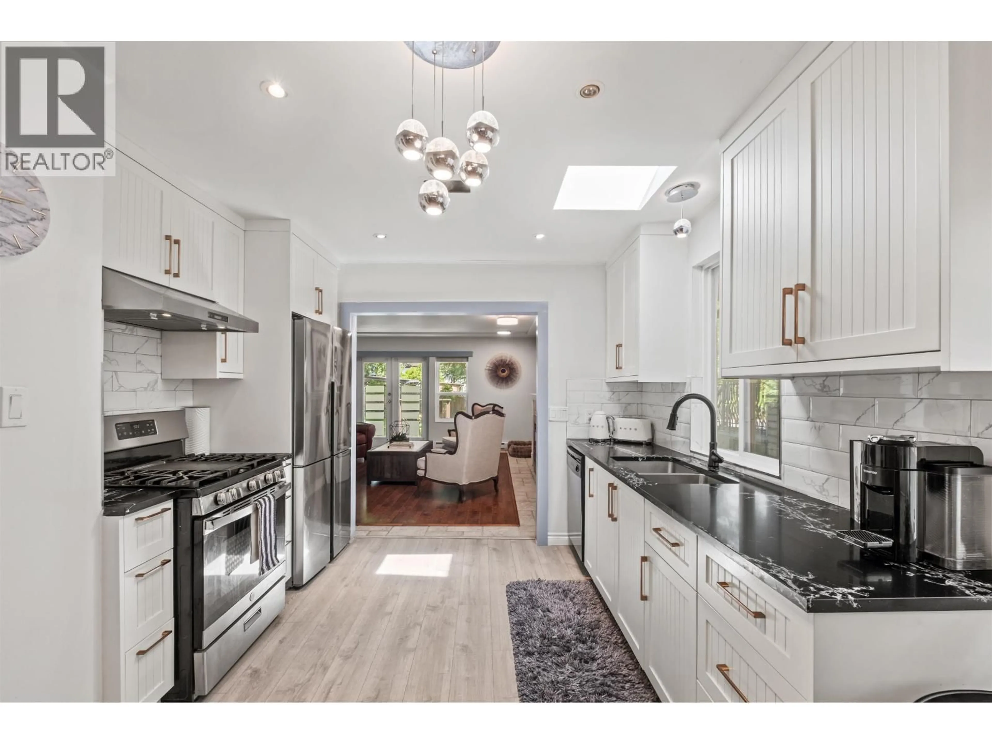 Open concept kitchen, ceramic/tile floor for 2808 EASTERN AVENUE, North Vancouver British Columbia V7N1S7