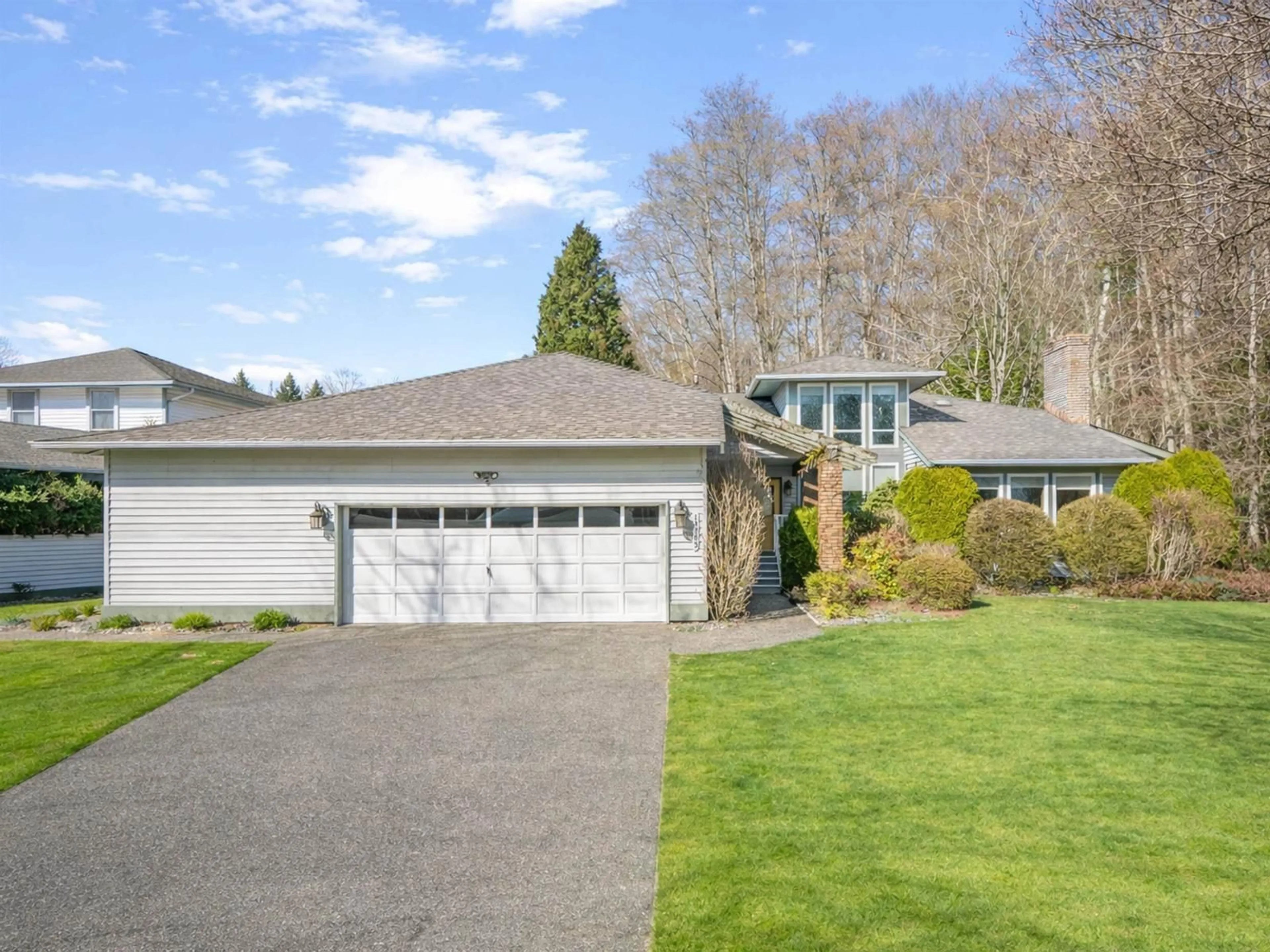 Home with vinyl exterior material, street for 13383 14A AVENUE, Surrey British Columbia V4A7P9