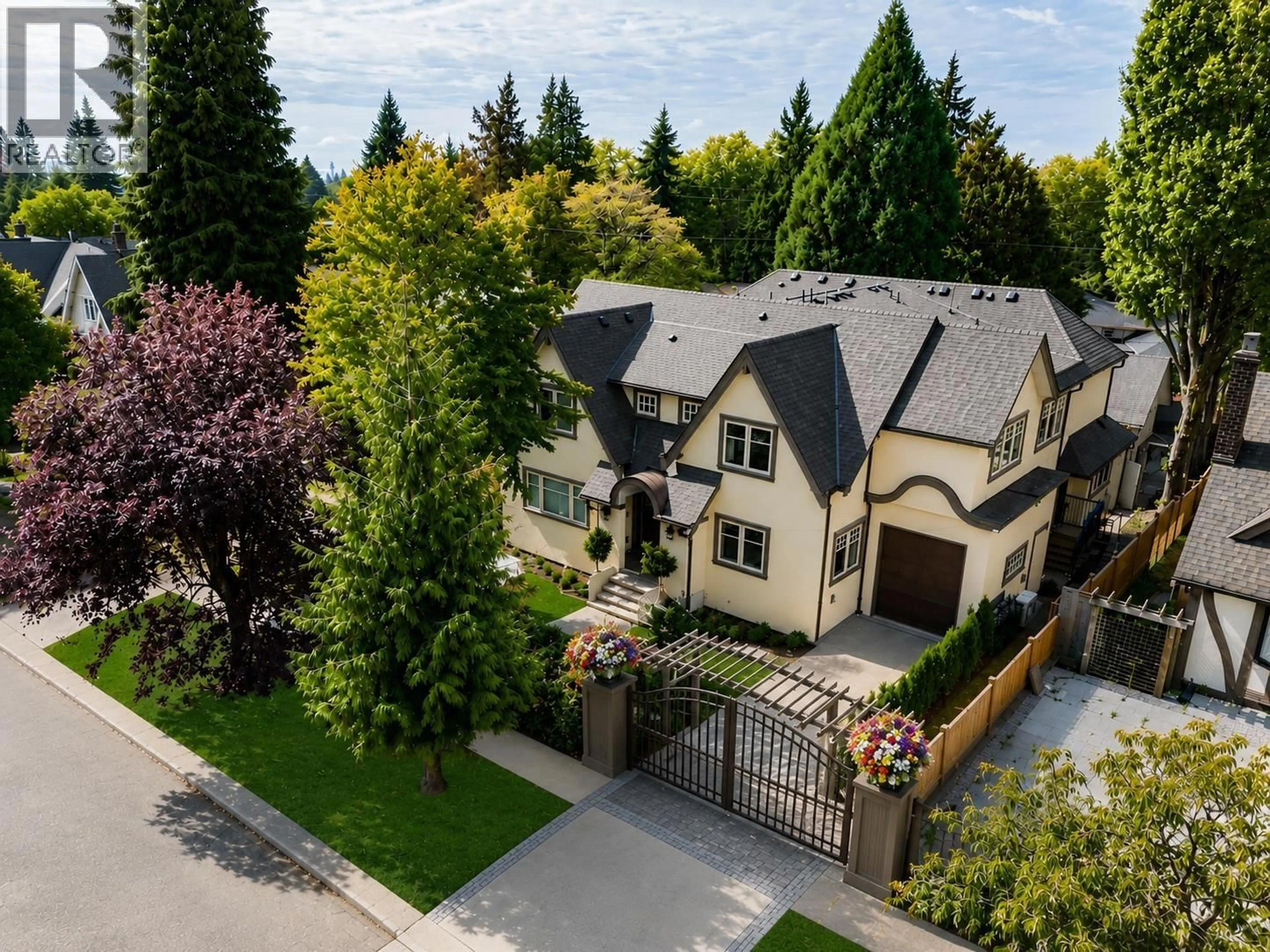 A pic from outside/outdoor area/front of a property/back of a property/a pic from drone, street for 7061 CYPRESS STREET, Vancouver British Columbia V7N3E6