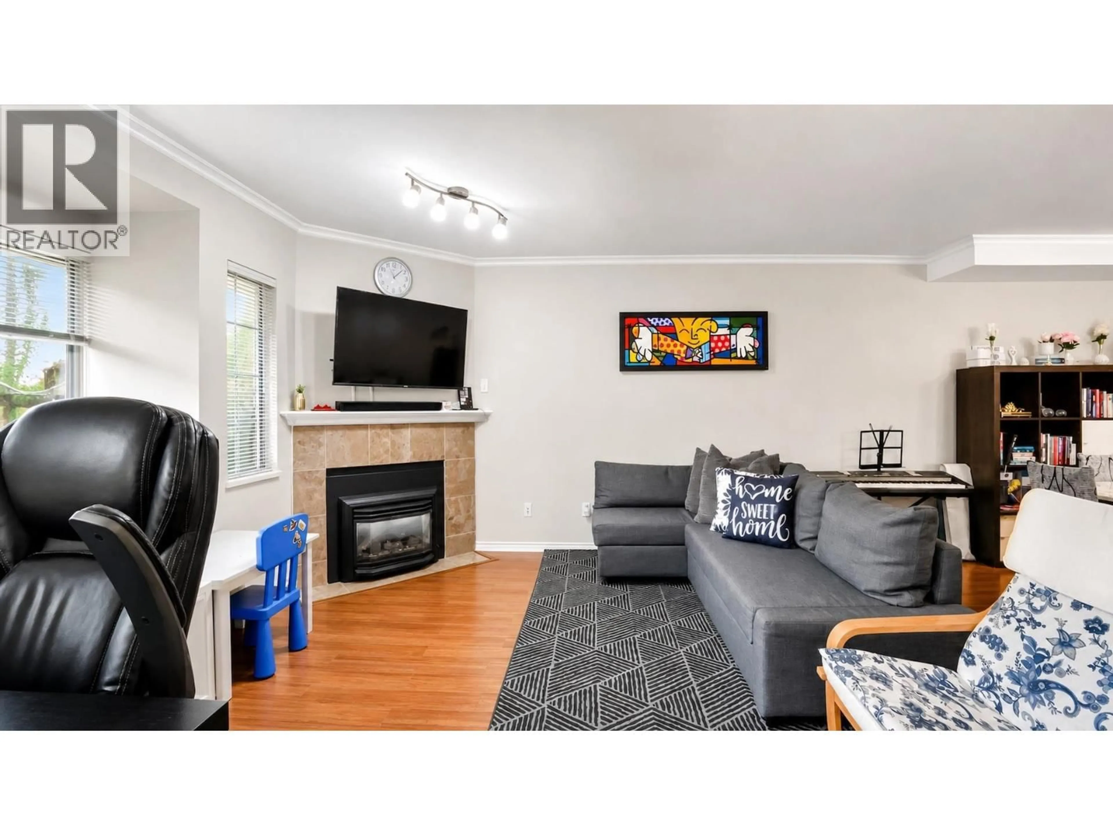Living room with furniture, wood/laminate floor for 29 - 355 DUTHIE AVENUE, Burnaby British Columbia V5A2P3