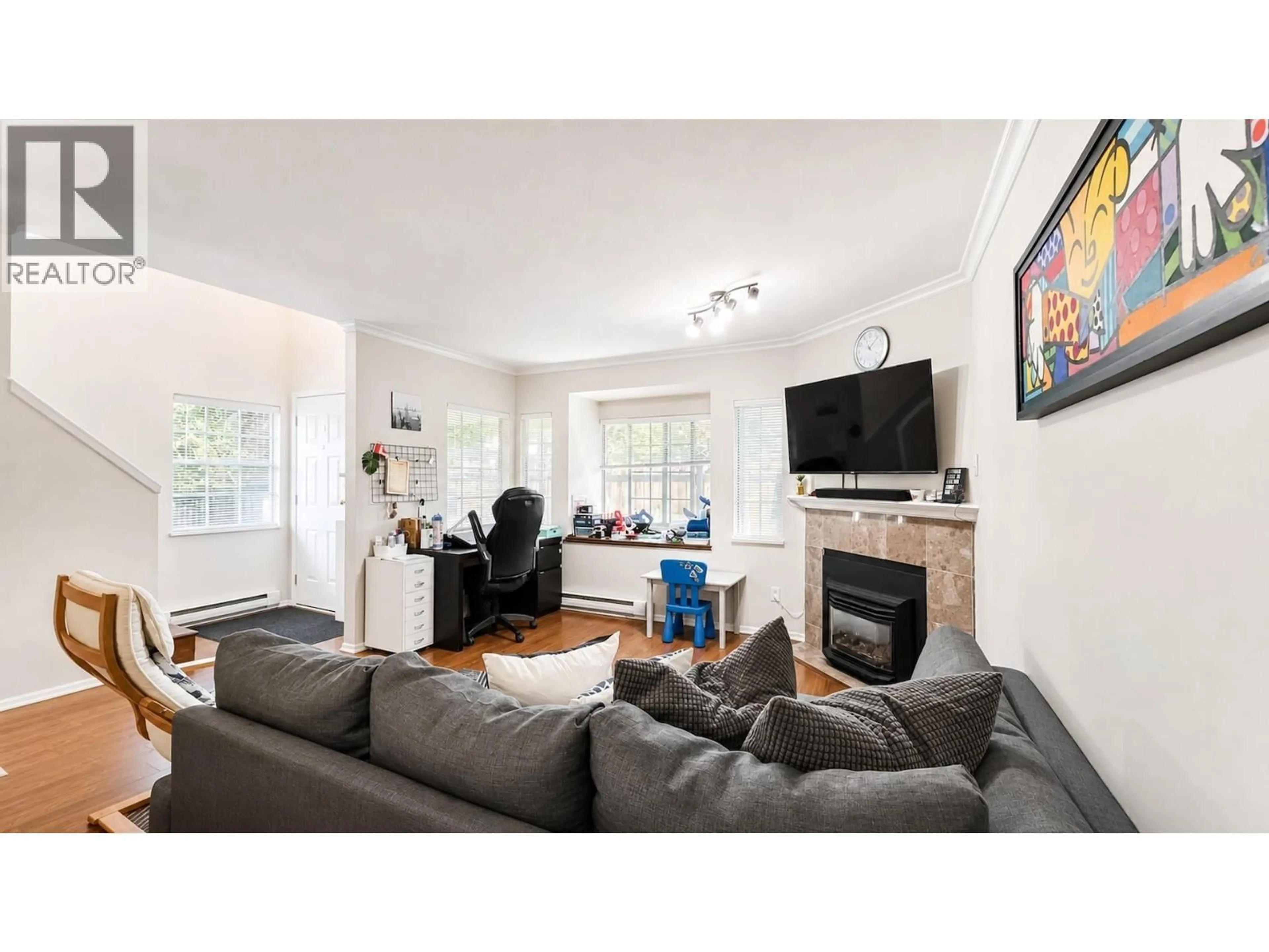 Living room with furniture, wood/laminate floor for 29 - 355 DUTHIE AVENUE, Burnaby British Columbia V5A2P3