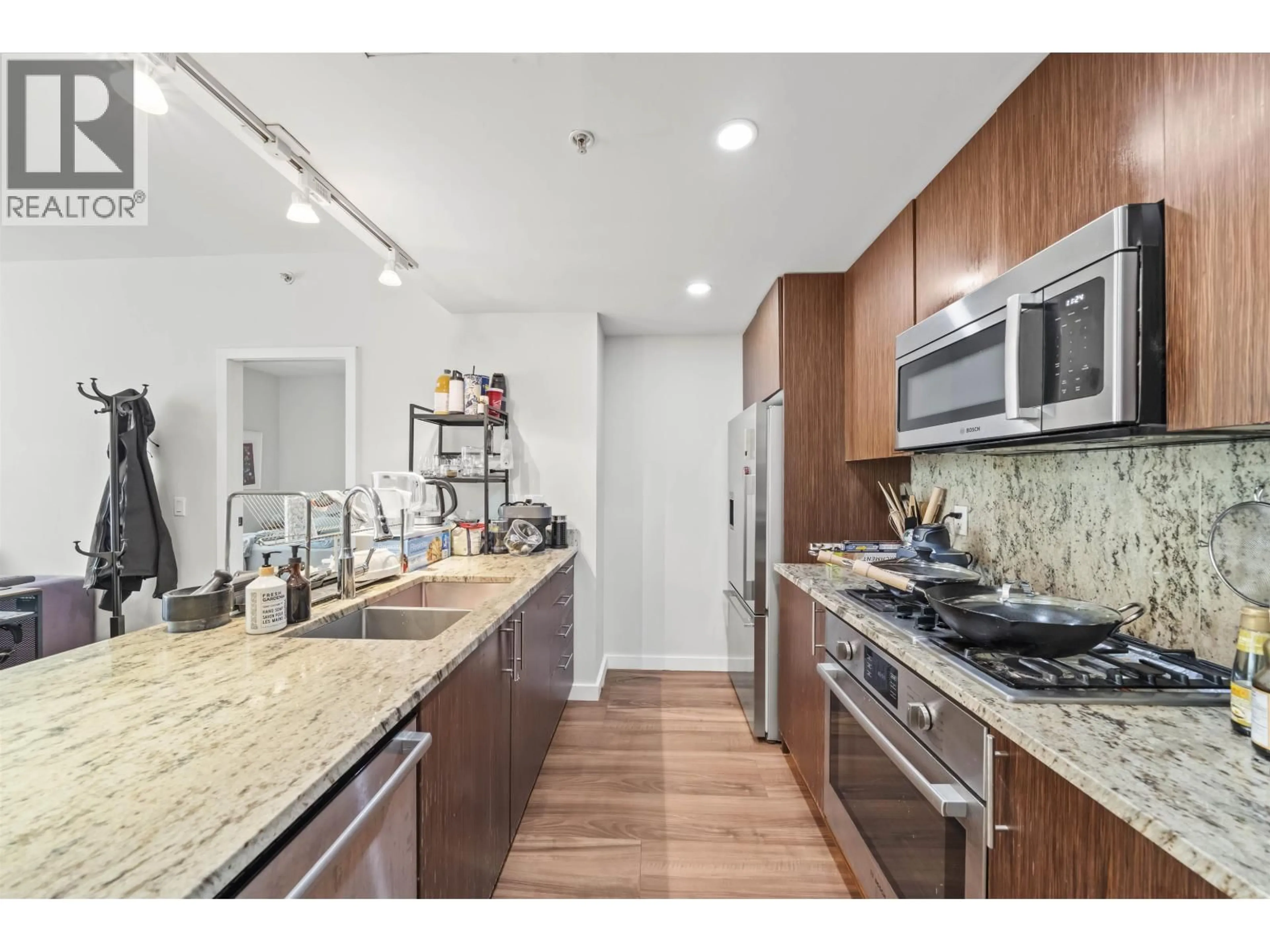 Open concept kitchen, unknown for 515 - 8688 HAZELBRIDGE WAY, Richmond British Columbia V6X0R6