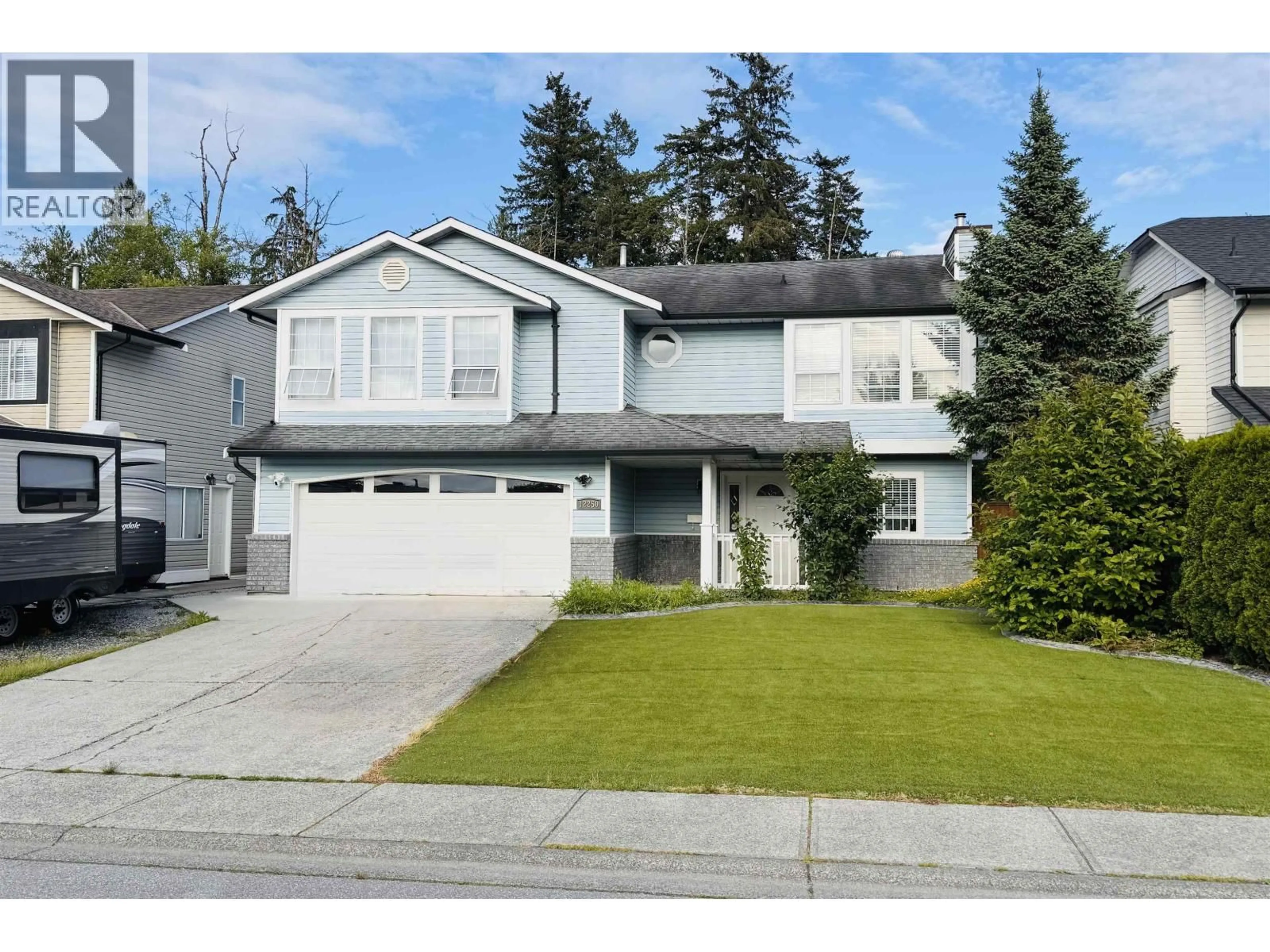 Home with vinyl exterior material, street for 12250 234 STREET, Maple Ridge British Columbia V2X0X9