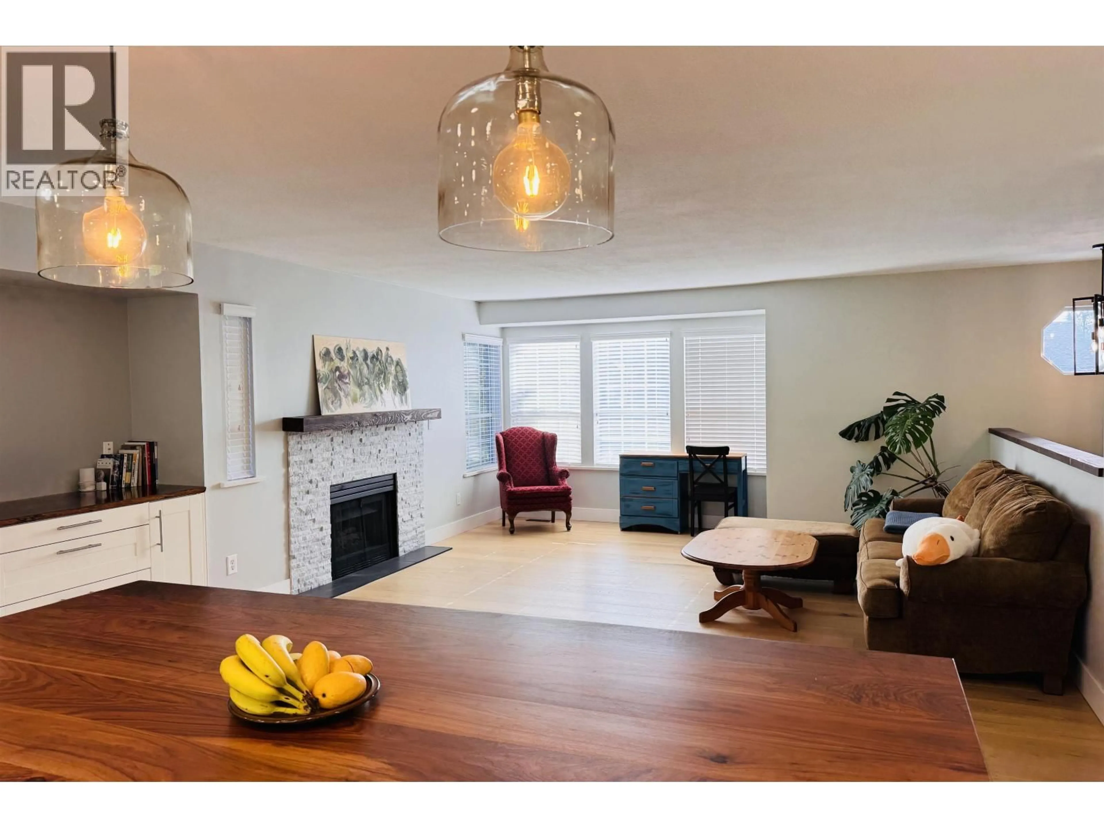 Living room with furniture, wood/laminate floor for 12250 234 STREET, Maple Ridge British Columbia V2X0X9