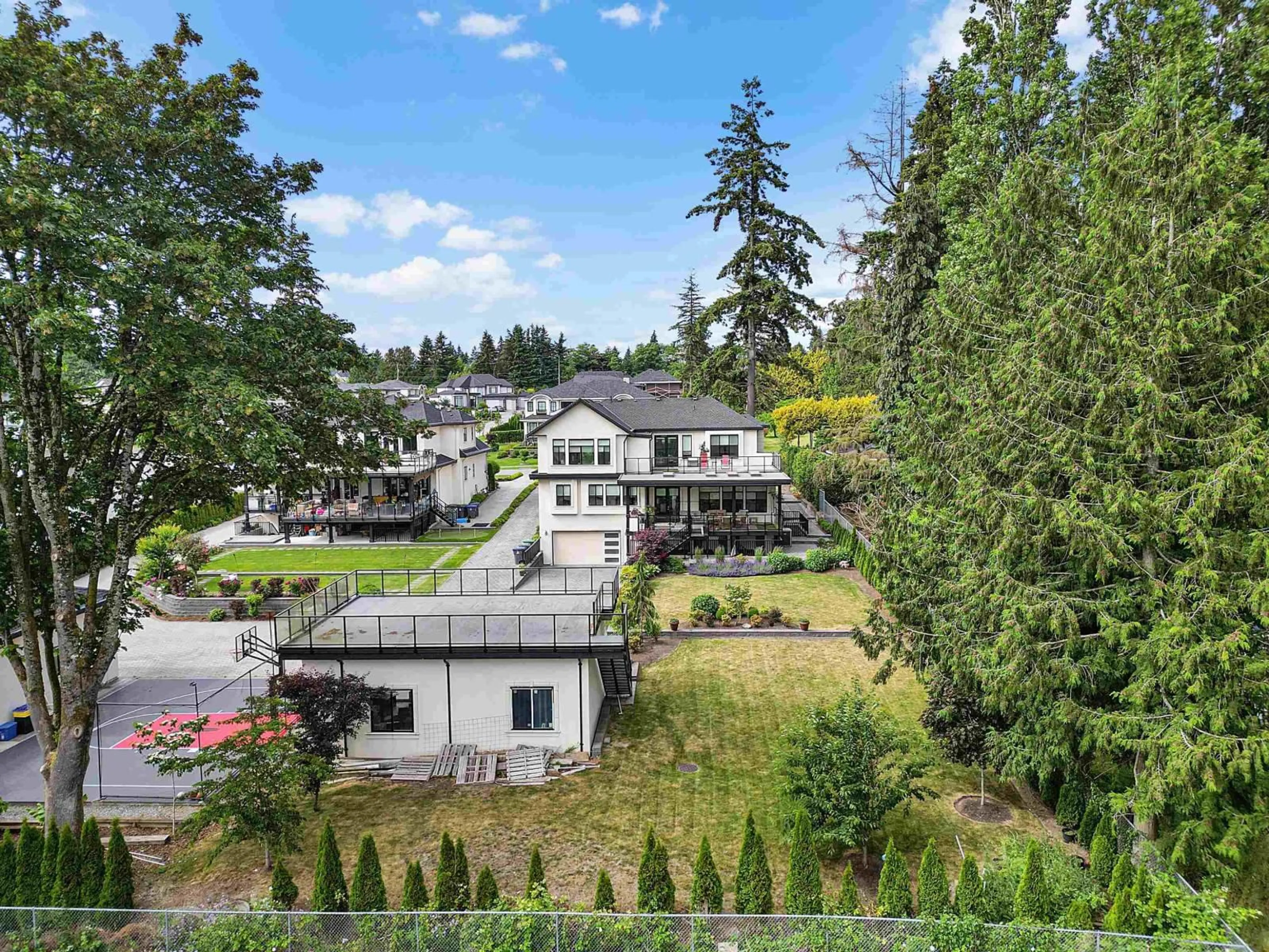 A pic from outside/outdoor area/front of a property/back of a property/a pic from drone, mountain view for 13170 57 AVENUE, Surrey British Columbia V3X0K2