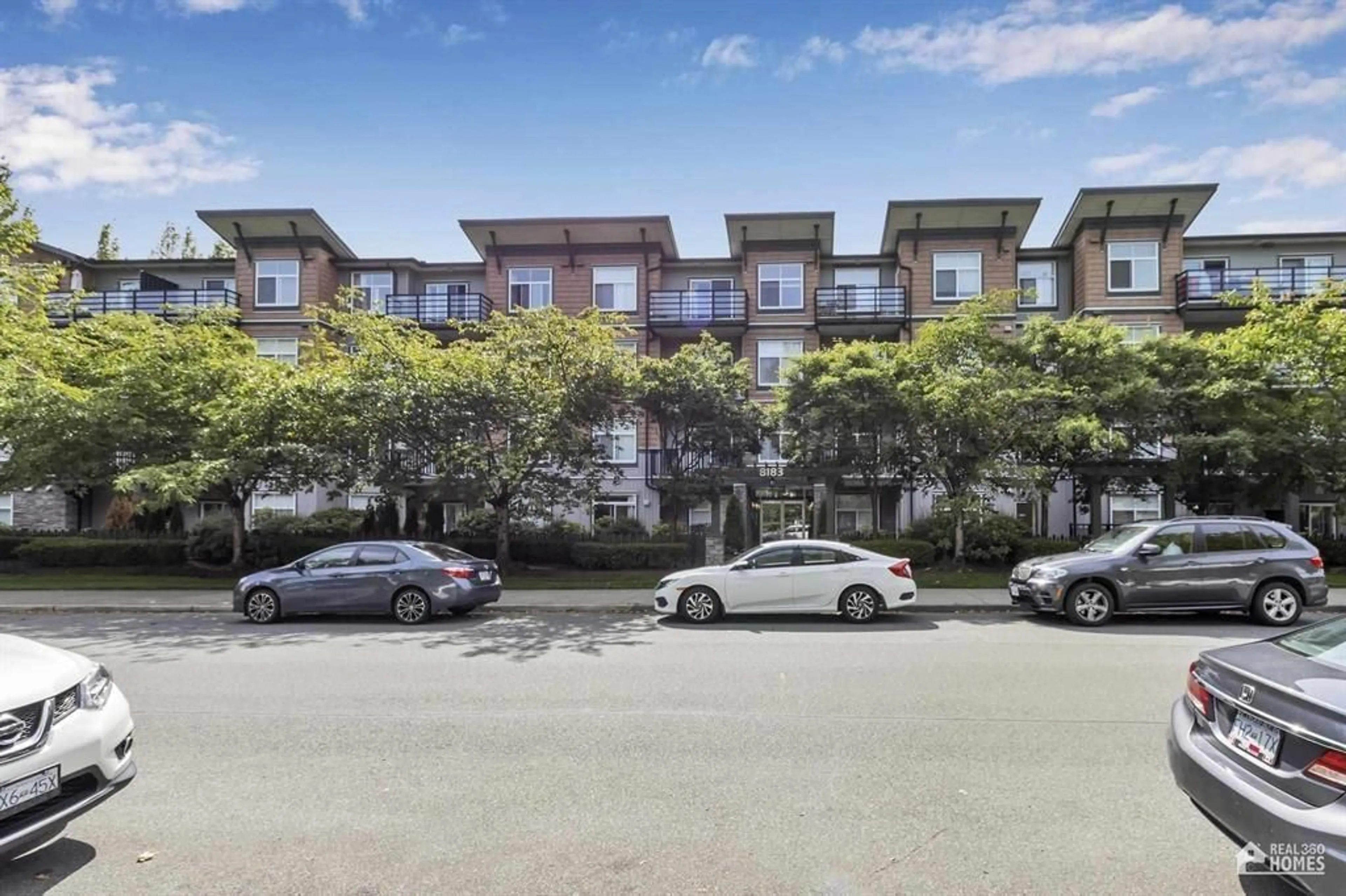 A pic from outside/outdoor area/front of a property/back of a property/a pic from drone, street for 320 - 8183 121A STREET, Surrey British Columbia V3W1S7