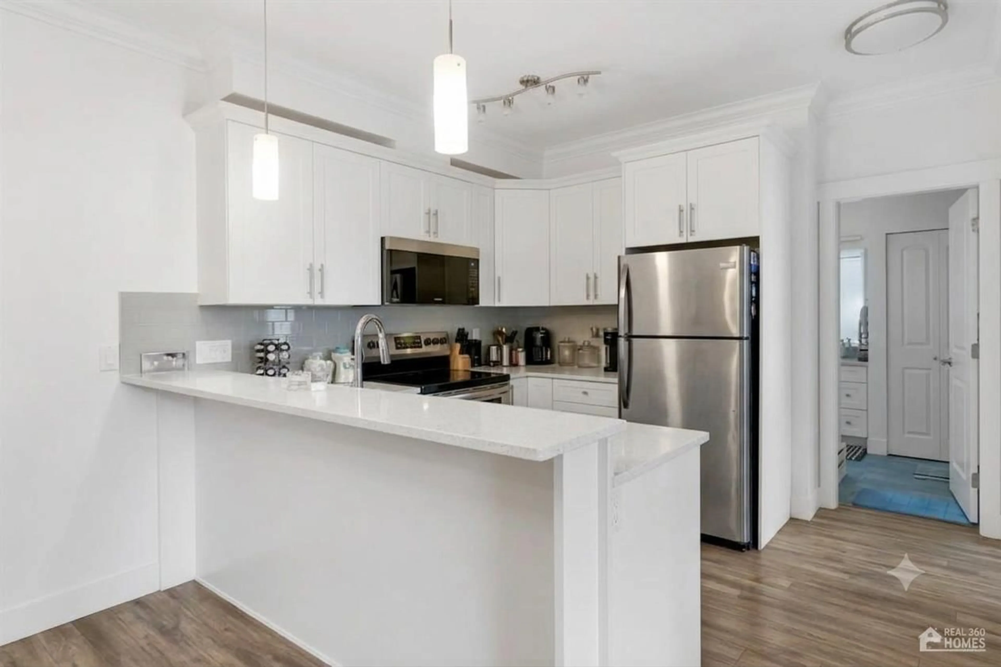 Open concept kitchen, unknown for 320 - 8183 121A STREET, Surrey British Columbia V3W1S7
