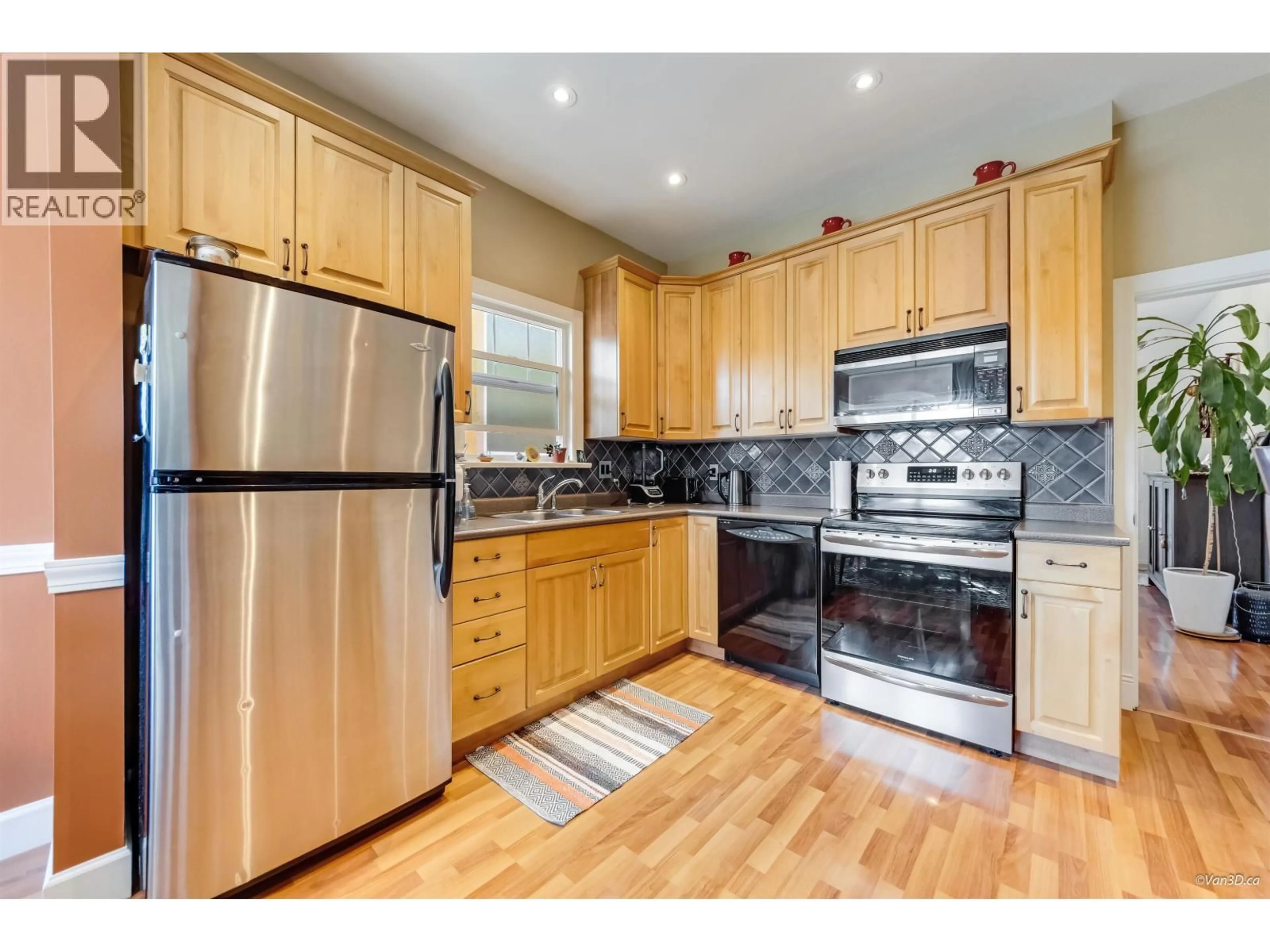 Standard kitchen, wood/laminate floor for 836 68TH AVENUE, Vancouver British Columbia V6P2V2
