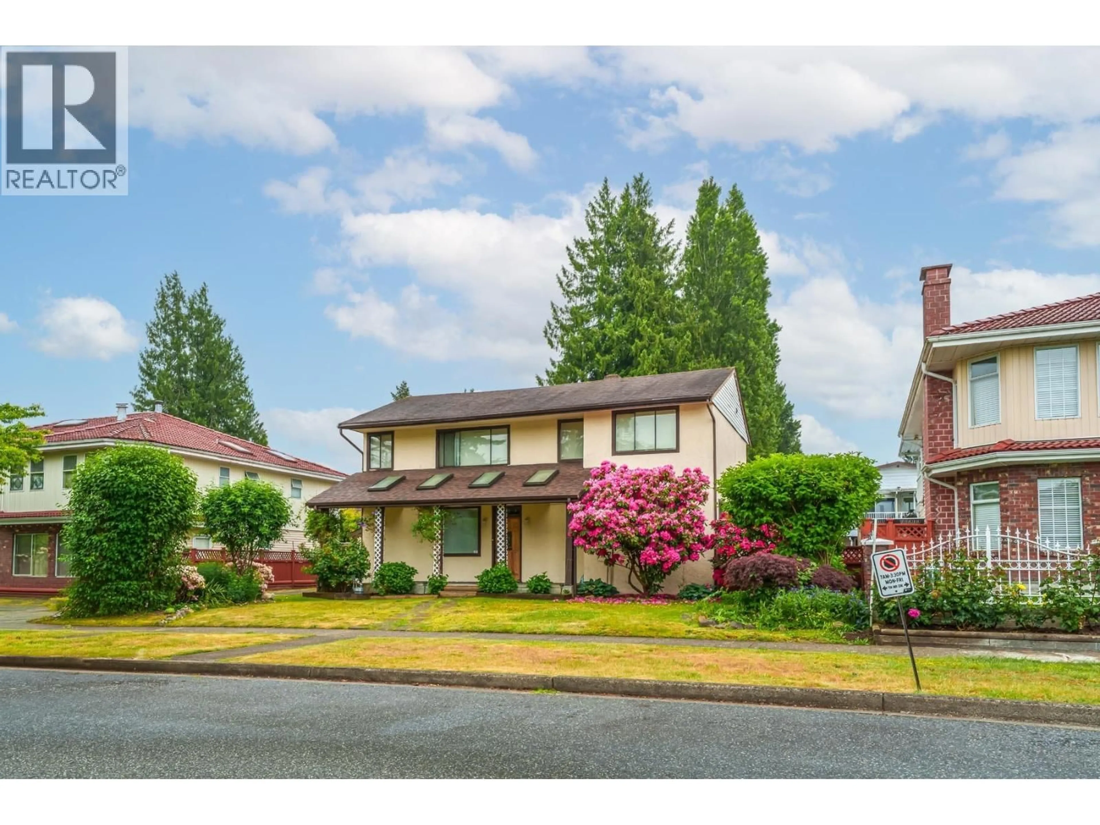 Home with vinyl exterior material, street for 7624 ULSTER STREET, Burnaby British Columbia V5E2E9