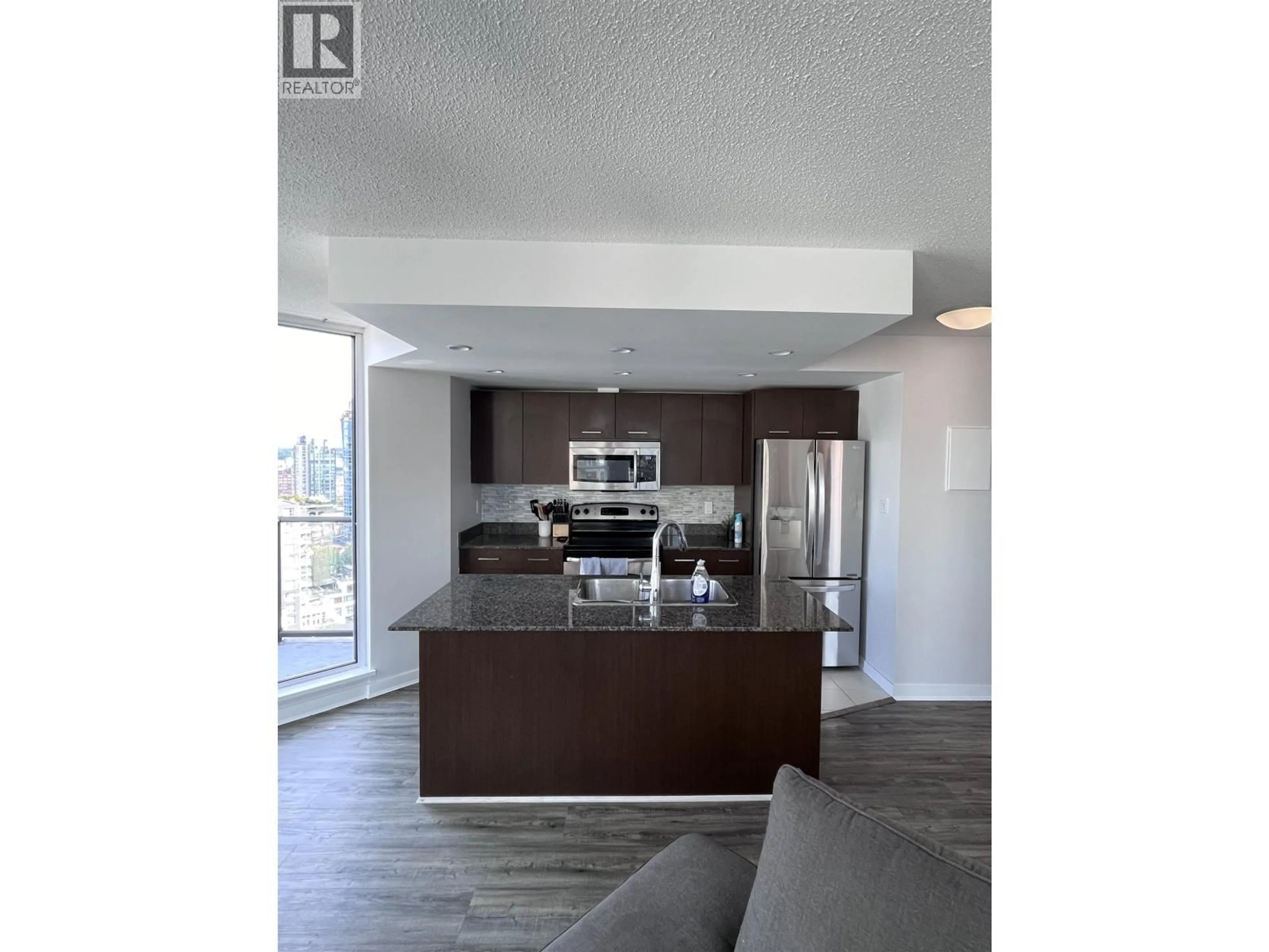 Open concept kitchen, wood/laminate floor for 1602 - 1212 HOWE STREET, Vancouver British Columbia V6Z2M9